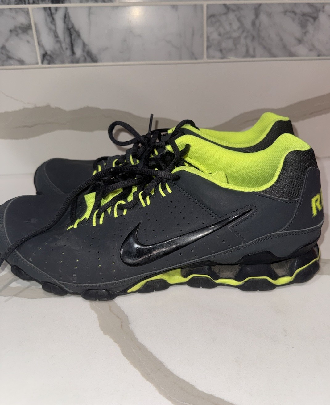 Nike Reax training shoes in an anthracite and volt green colorway Size 12