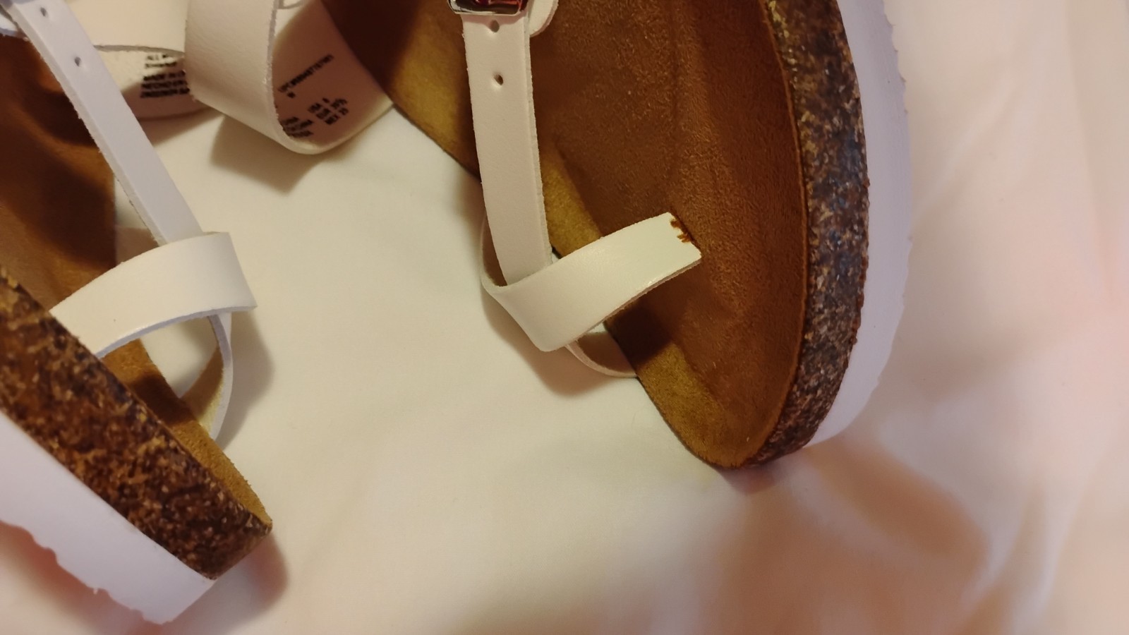 Open Toe And Open Back White Sandals With Buckles On Top