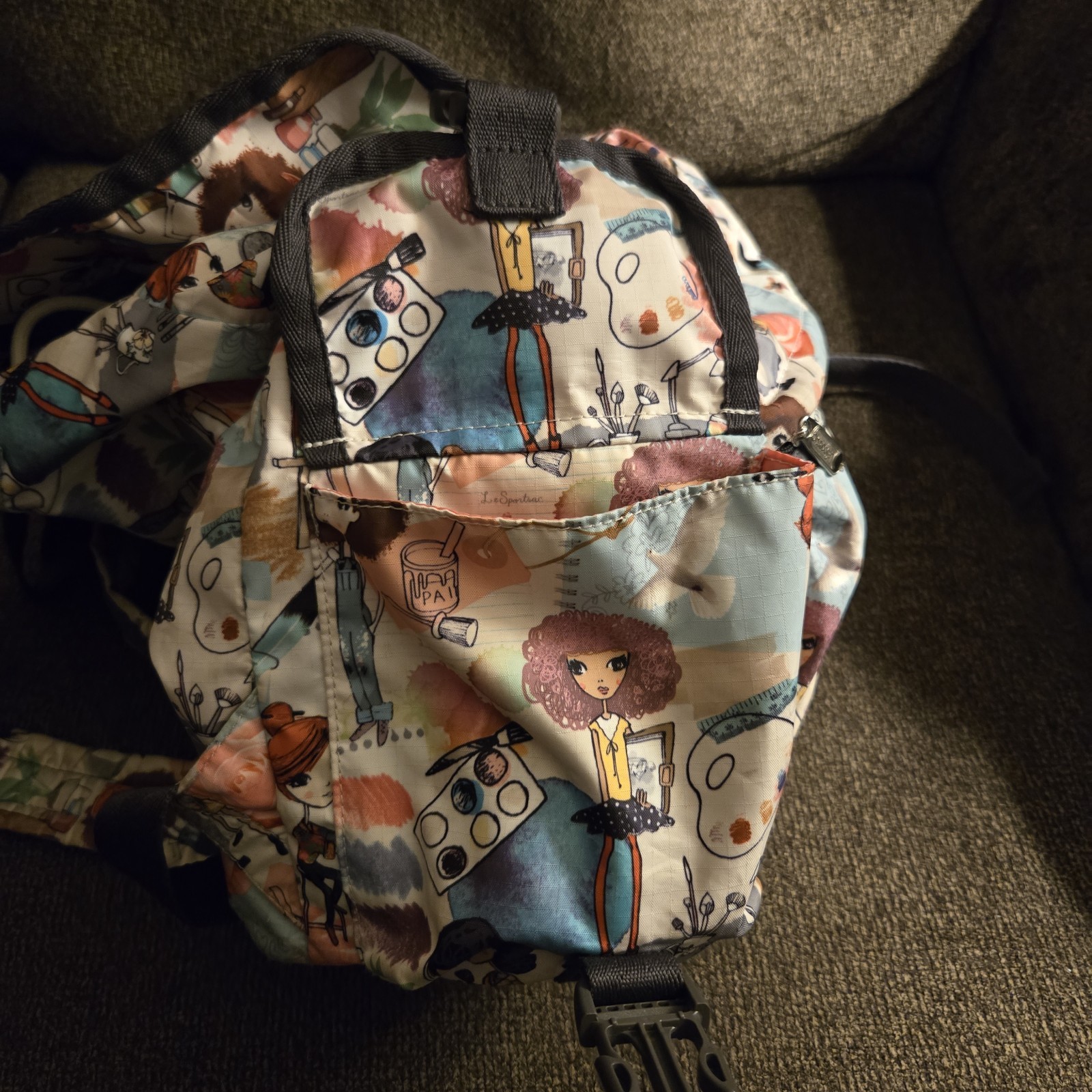 LeSportsac Voyager Backpack ‘Art School’ Cartoon Graphic Pink Lining 13″ x 16″