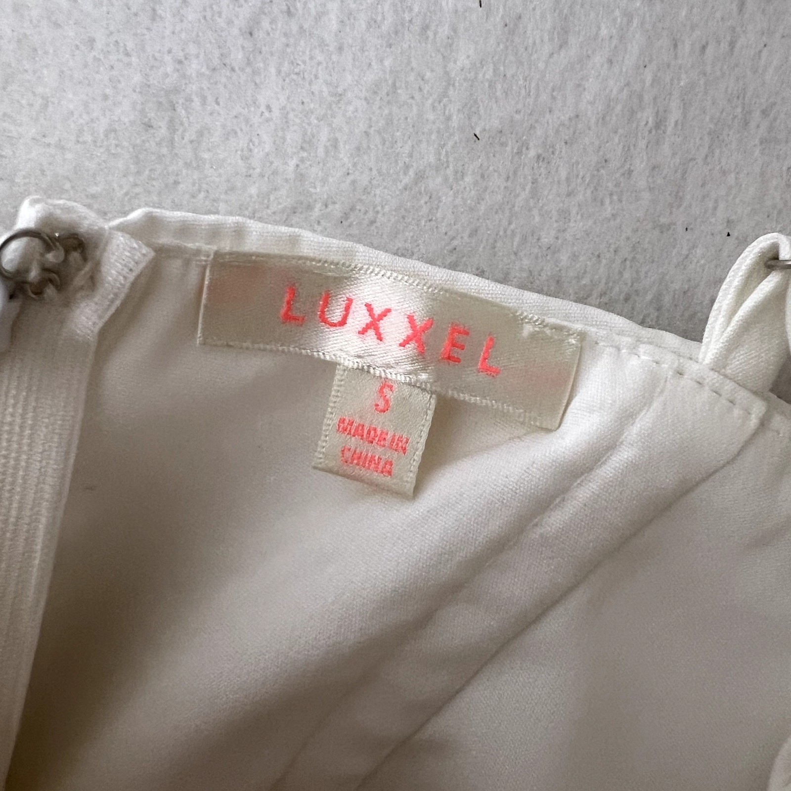 Luxxel White Low Cut Batwing Sleeve Romper