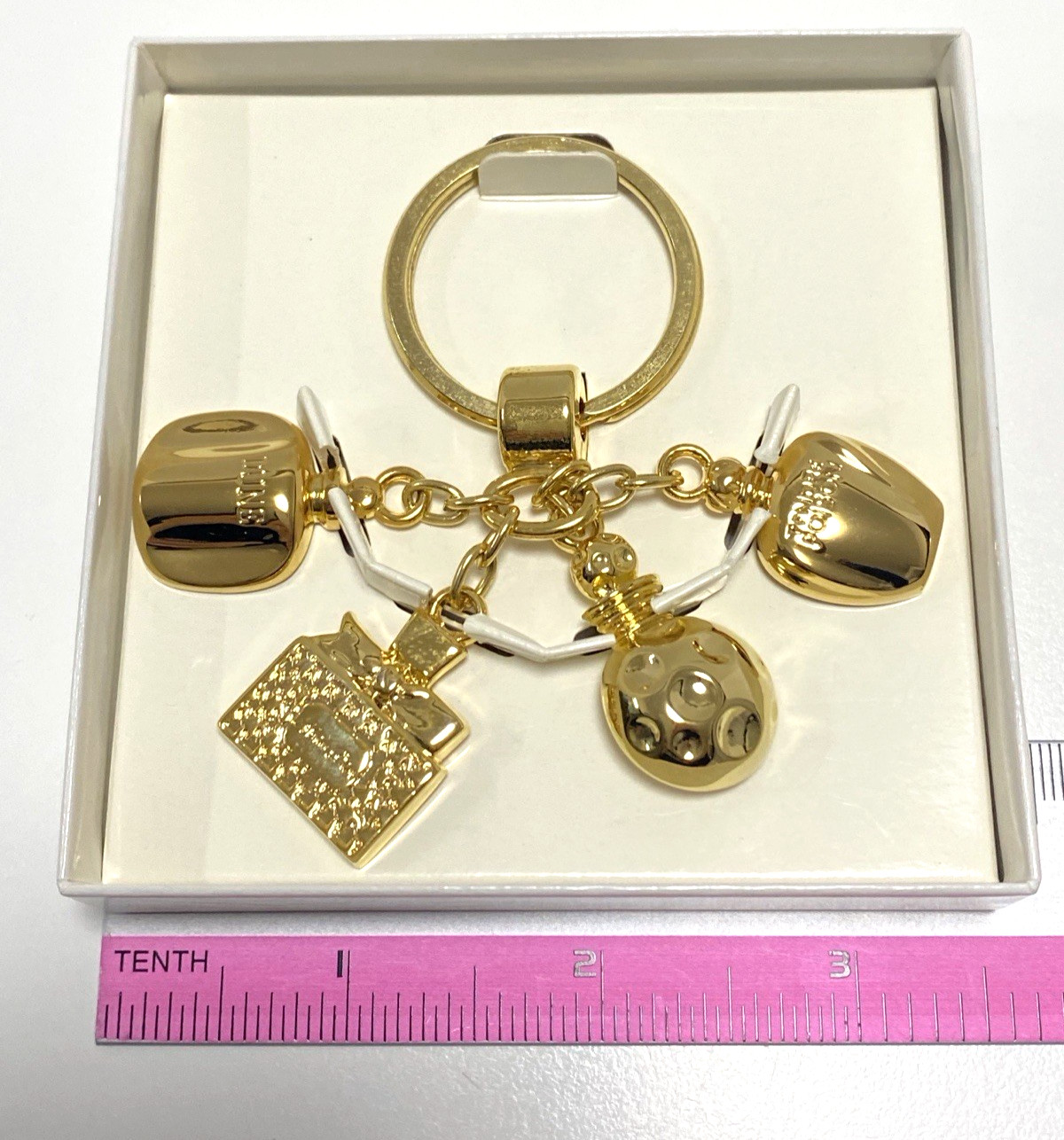 Dior novelty key chain bag charm key holder gold color brand near mint condition