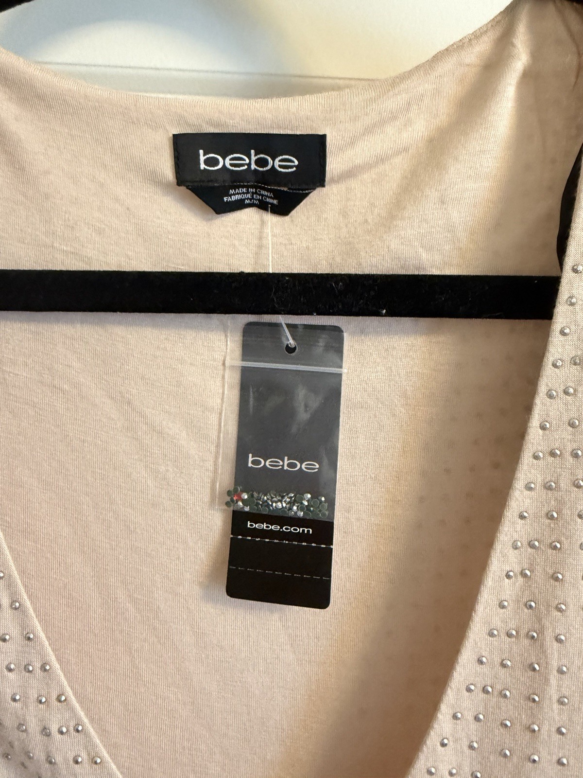New With Tags! Bebe Studded Shoulder Pad Dress nude color. Bebe Medium (US M)