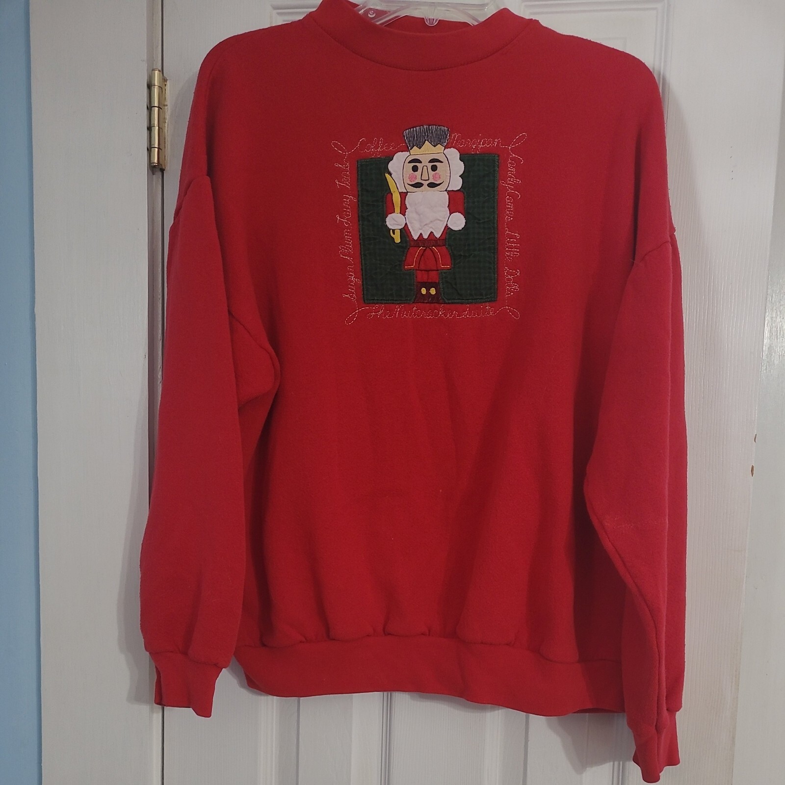 Vintage Red NutCracker Sweatshirt, 48″ Chest and 26″ Long from top to bottom.