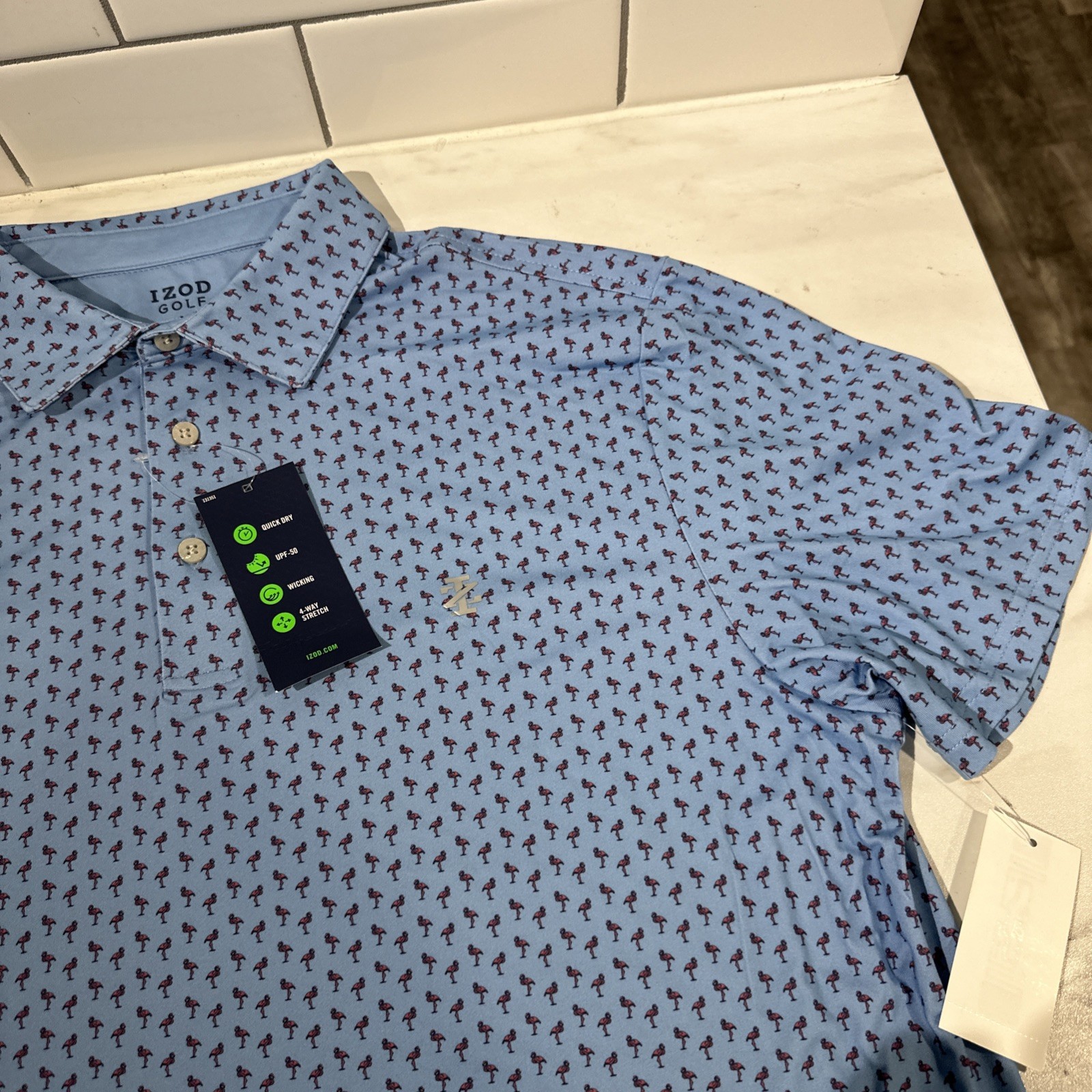 IZOD Golf Swingflex Elite Performance Golf Polo Golf Medium Flamingo UPF 50