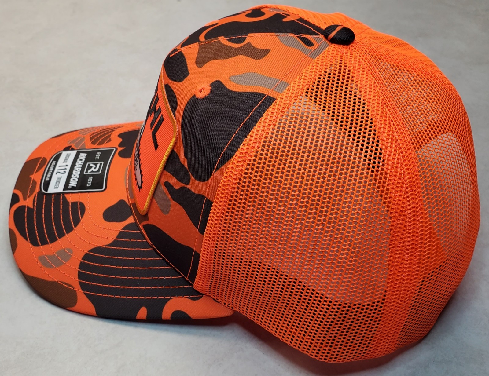 STIHL Patch on Richardson 112 Trucker Hat Snapback / Blaze Orange Camo
