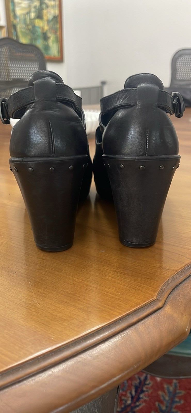 Dansko 37 Black Clogs with Buckle Strap and Metal Tooling on the Heel