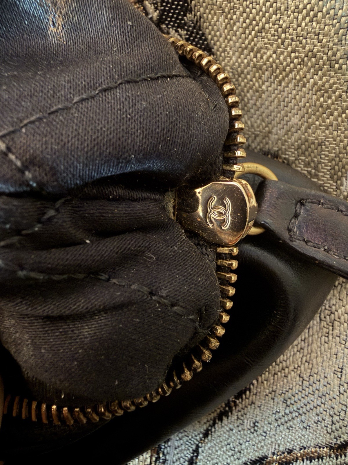 CHANEL Black Quilted Zip Clutch Wrist Strap Chain Tassel Gold CC Logo