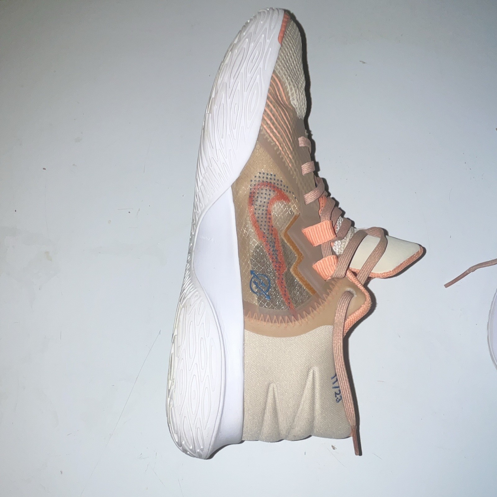 Nike Kyrie Men’s Mid Top Basketball Lace-Up Sneakers Beige Orange Blue