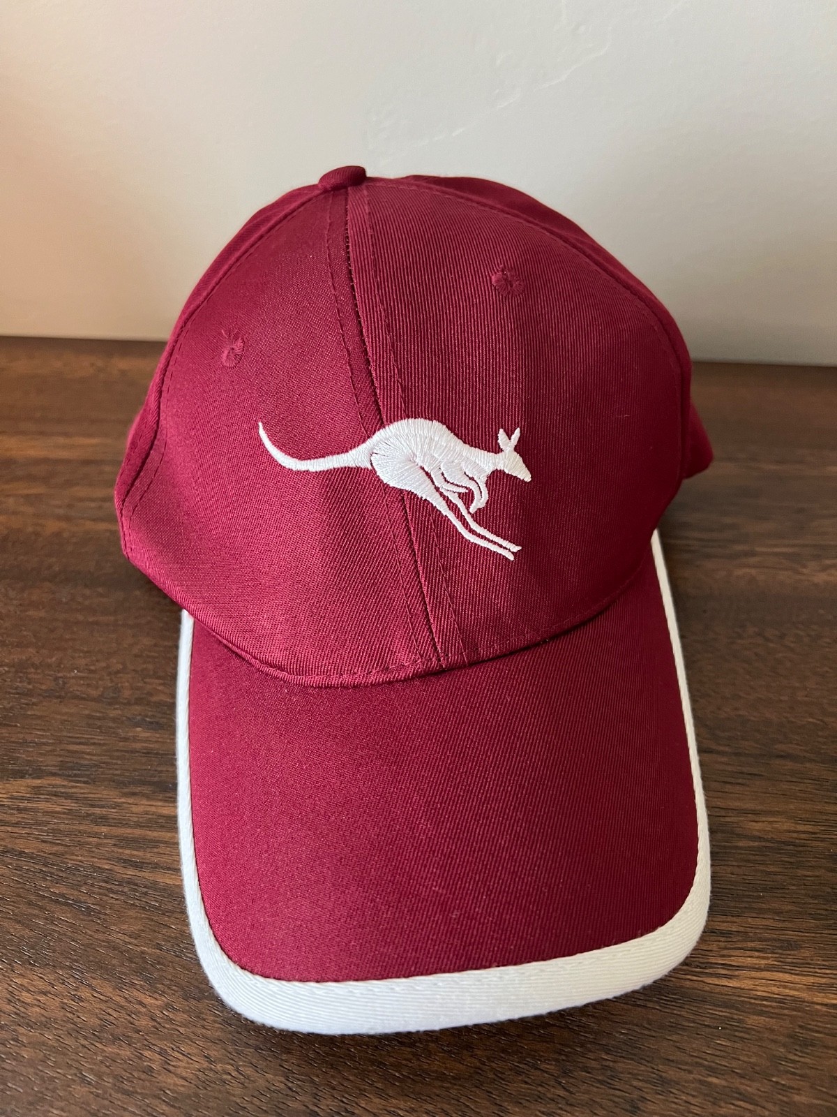 NWT AUSTRALIA CAP Hat KANGAROO BURGUNDY RED ROUND BRIM WHITE TRIM ADJ STRAP SM