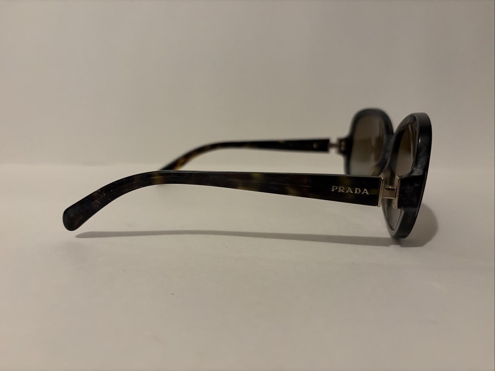 Prada SPR 17N Tortoise Brown Women’s Sunglasses 57mm 17mm 135mm