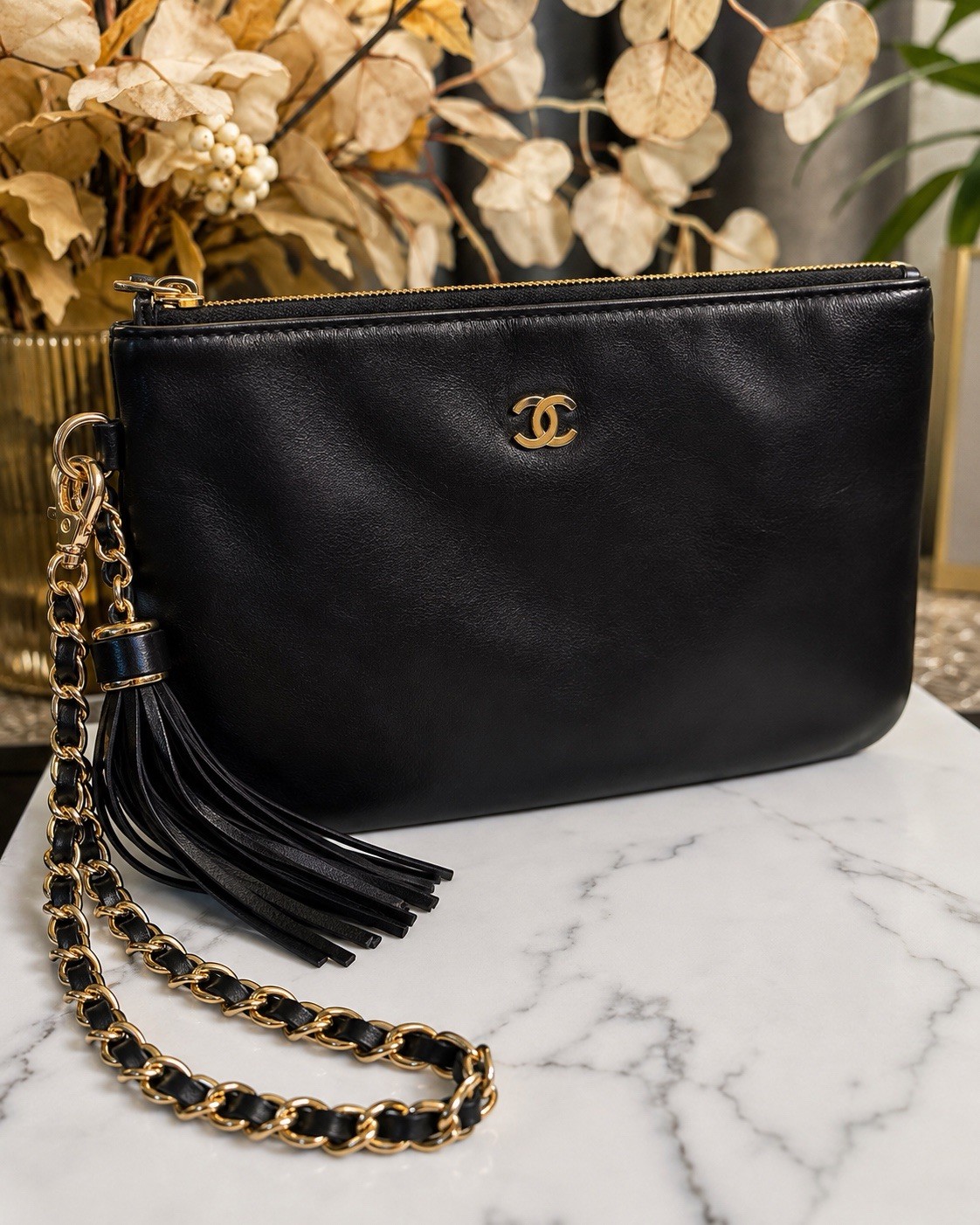 CHANEL Black Quilted Zip Clutch Wrist Strap Chain Tassel Gold CC Logo