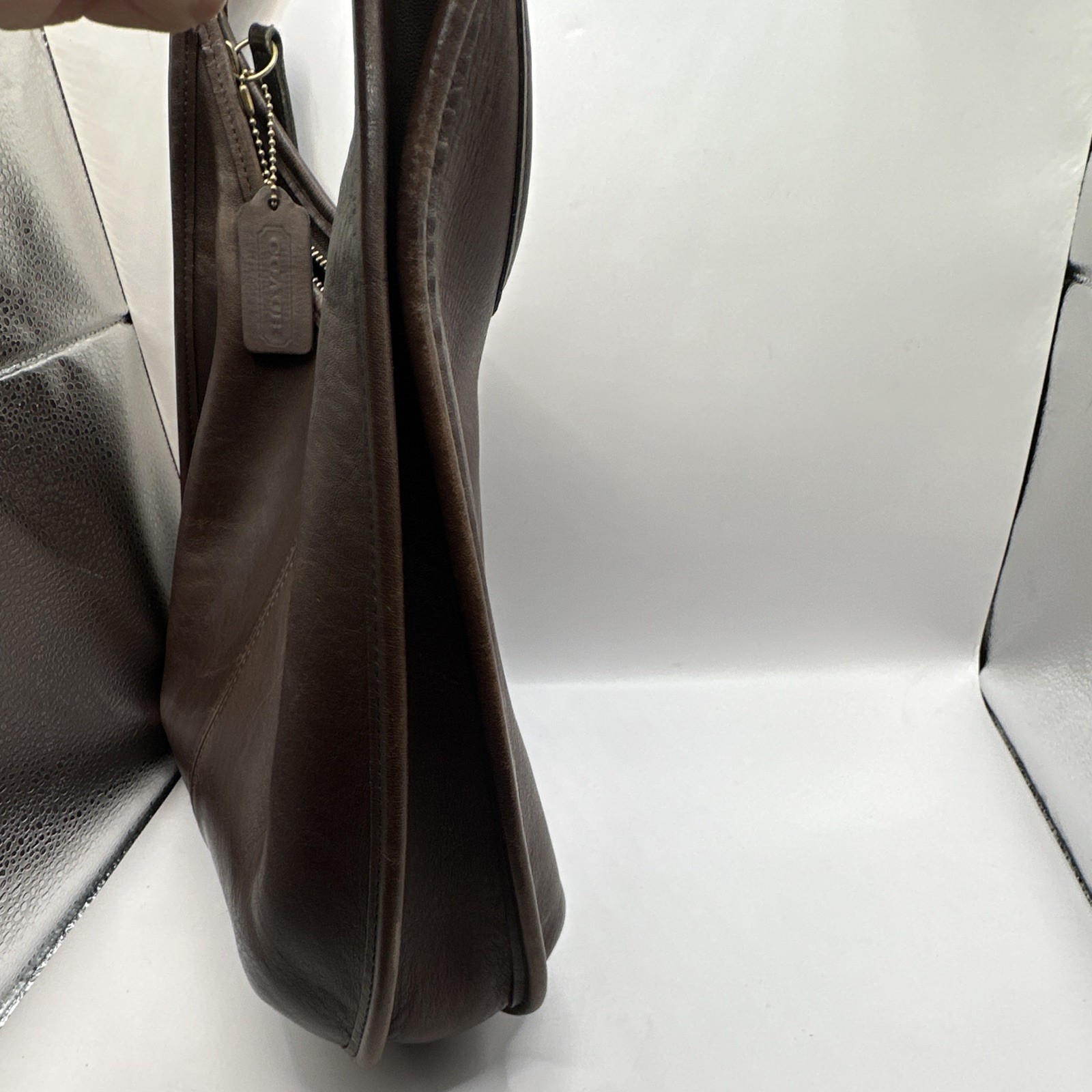 vintage Coach Ergo Zip Hobo Shoulder Bag crafted from mahogany brown leather.