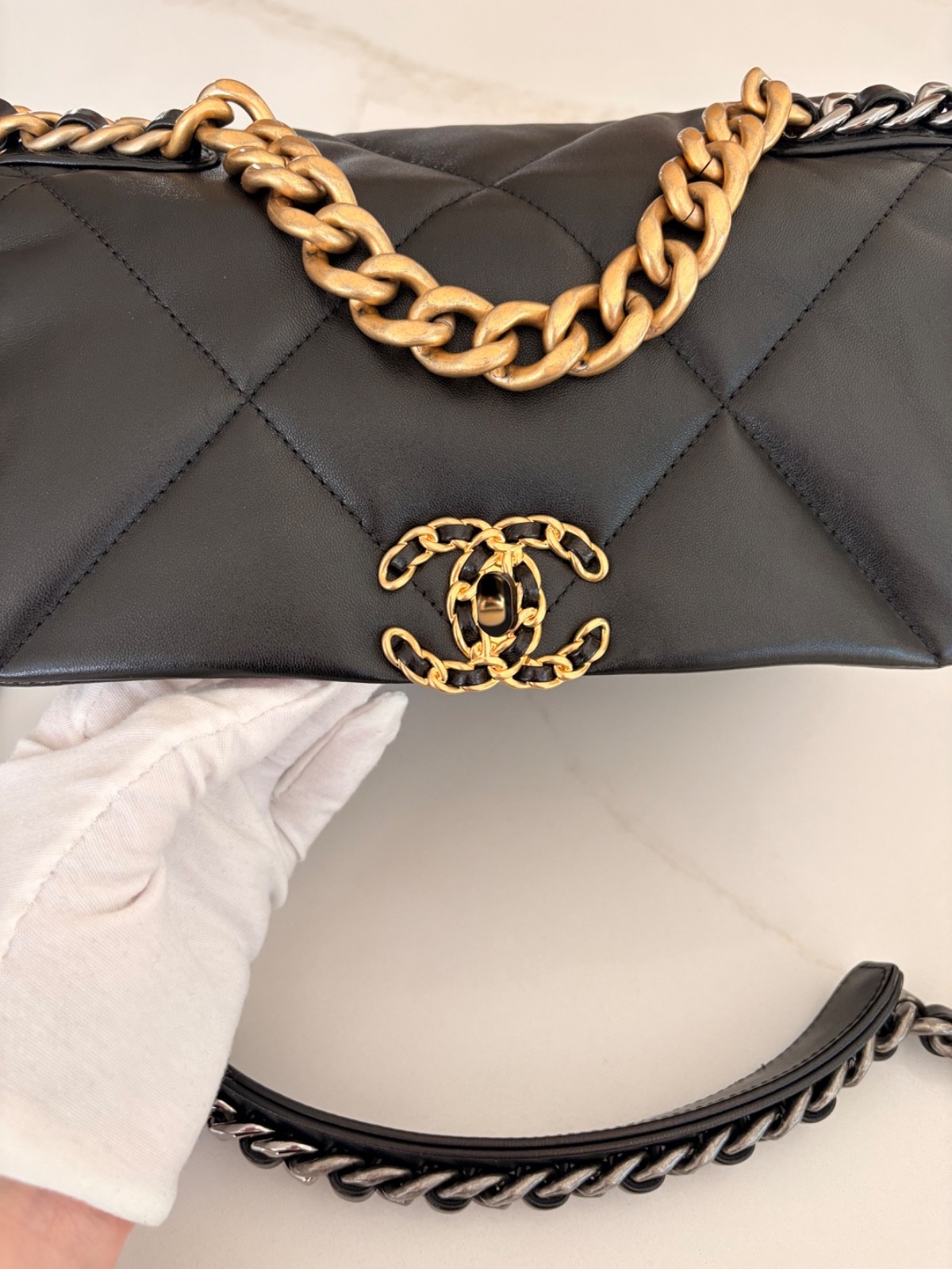 Authentic Chanel 19 in black Lambskin with mixed hardware size small