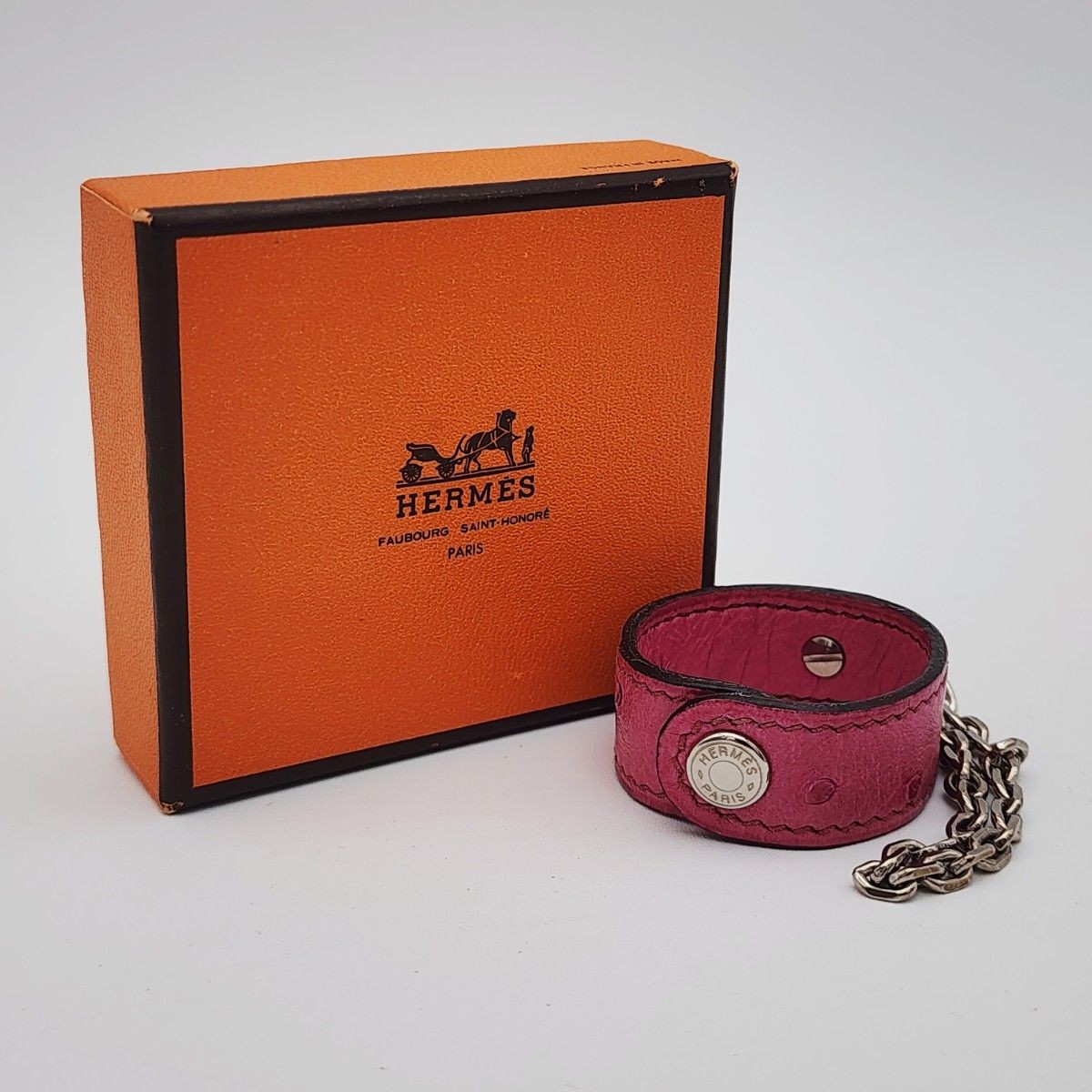HERMES Nomad Glove Holder Ostrich Leather Silver Hardware Pink 3.5cm Diameter