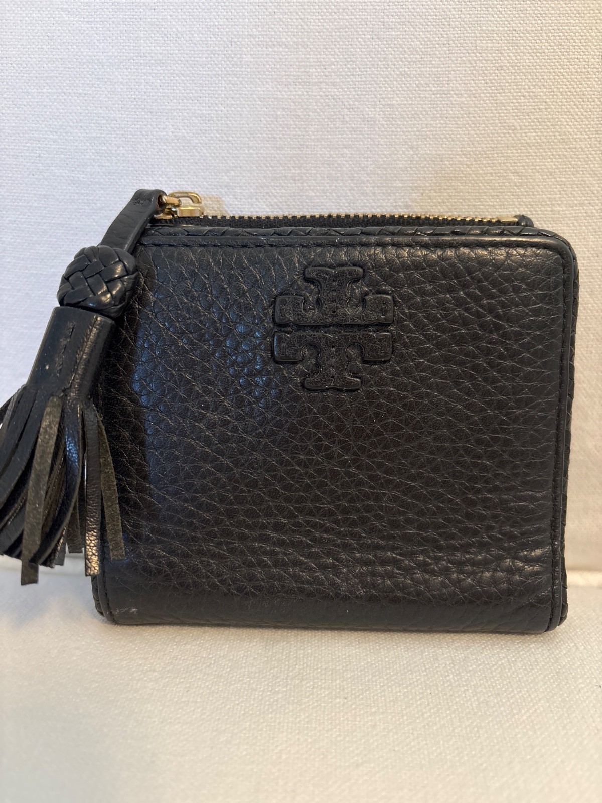 Tory Burch Thea Black Pebbled Leather Bifold Zip Wallet Tassel Gold Tone Logo