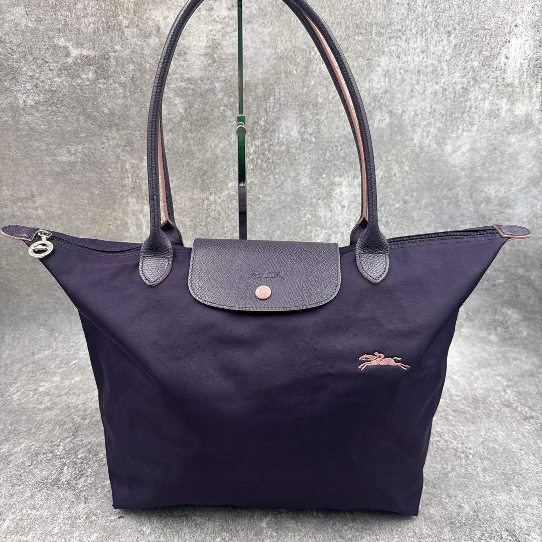 Excellent condition Longchamp Le Pliage Club L purple fits A4 size.