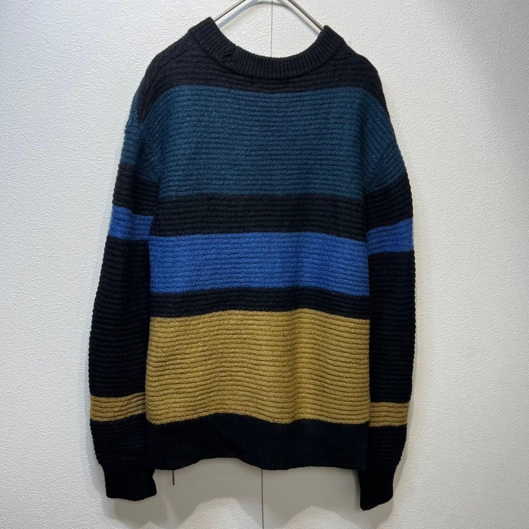 CULLNI Wool striped knit sweater with side zip design