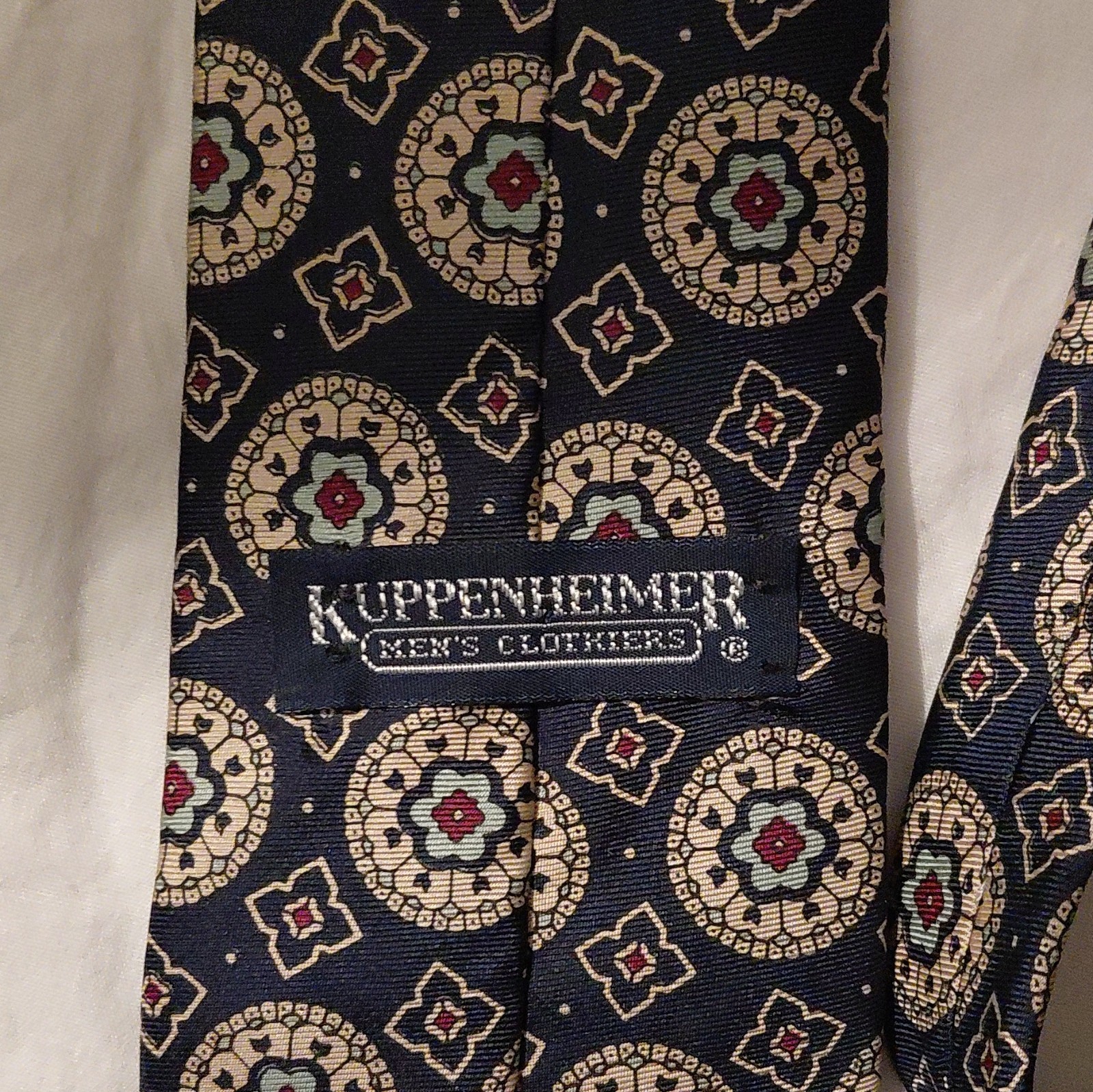 Kuppenheimer Blue Beige Red Geometric Woven Men’s Pointed Tie Logo Accent