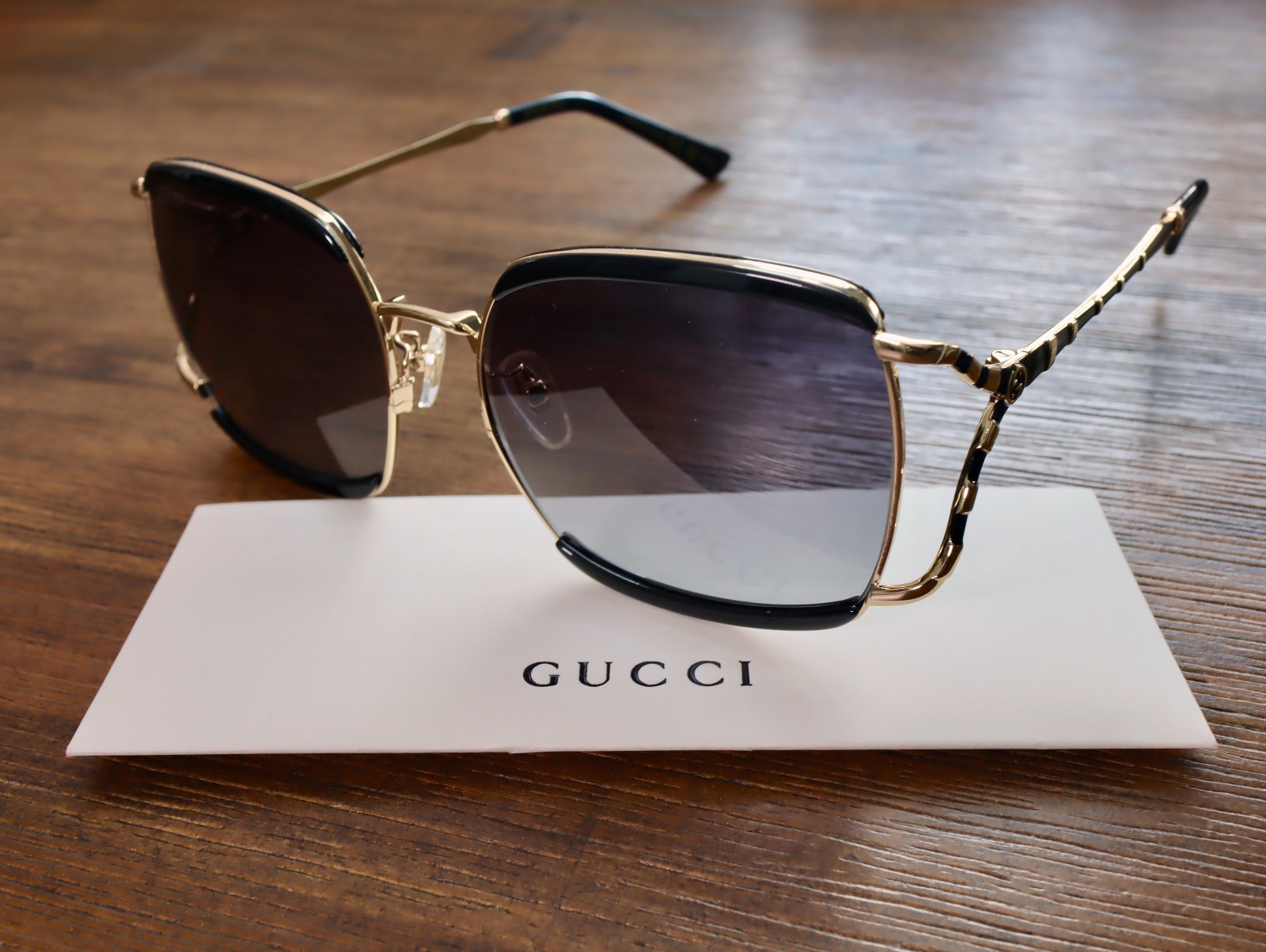 Gucci GG0593SK 001 59mm Oversized Square Sunglasses in Black/Gold and Gray Lens