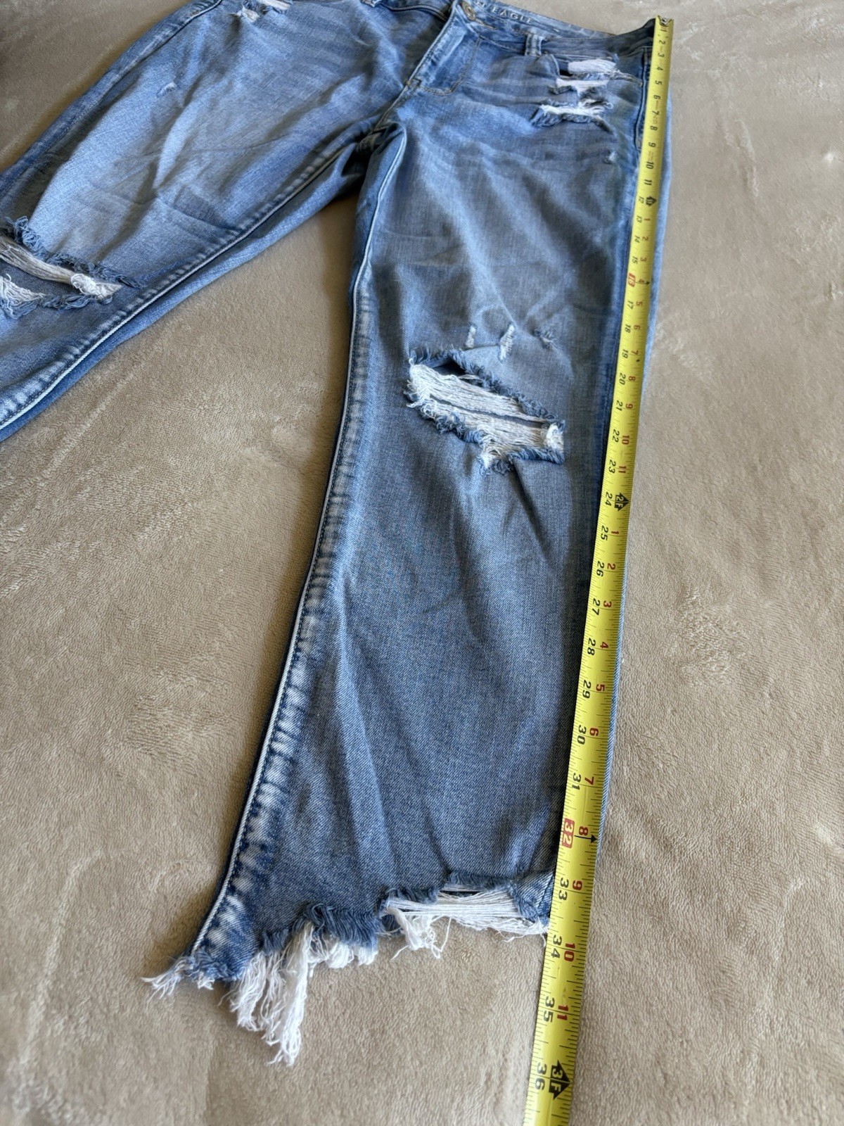 American Eagle Women’s Blue Light Wash High Rise Distressed Jegging