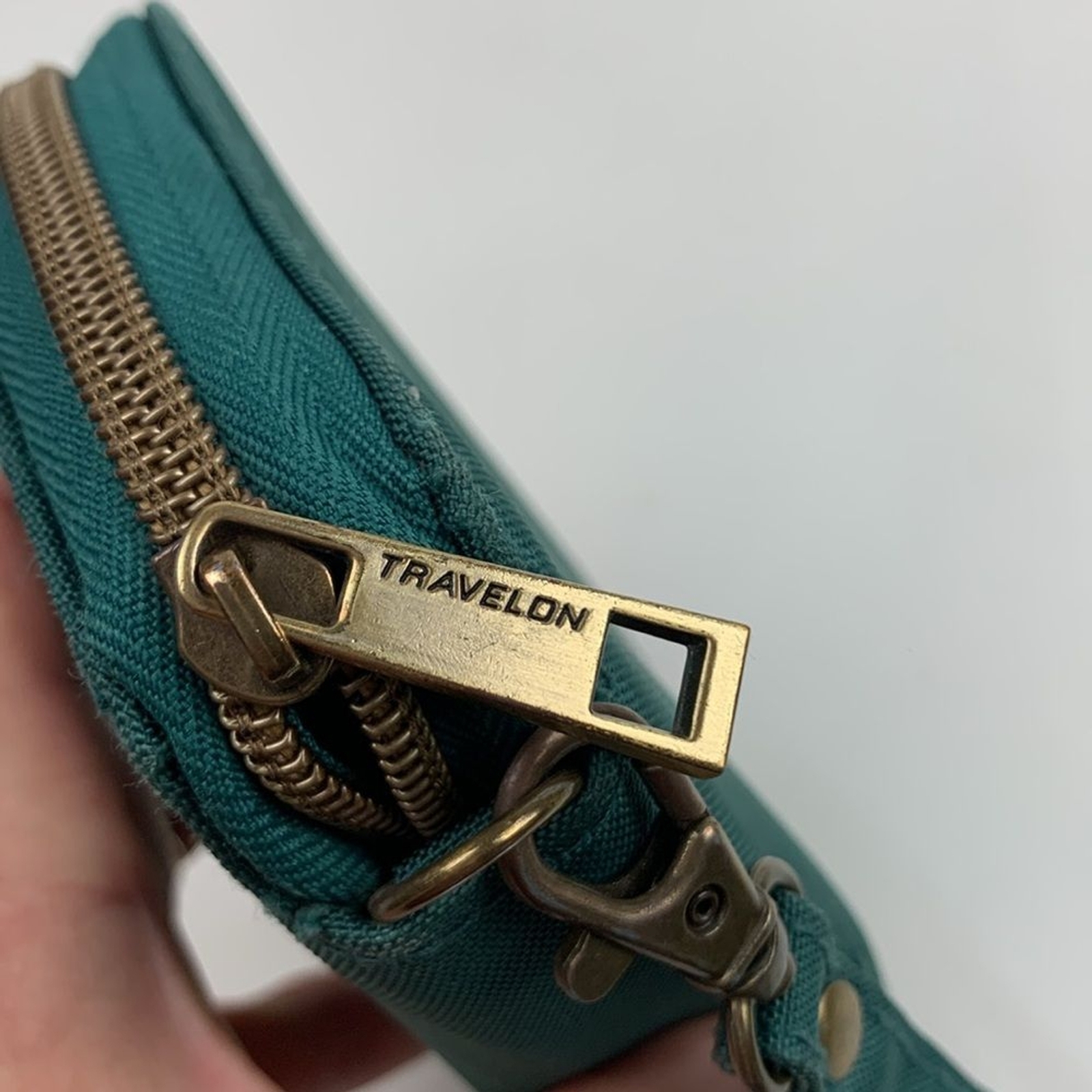 Travelon Dark Teal Green Clutch Wristlet wallet & brass Accents Zip around strap