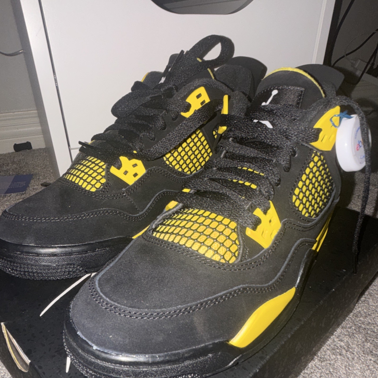 Jordan Air Jordan 4 Retro Thunder Black/Yellow Men’s Mid Top Basketball Sneaker