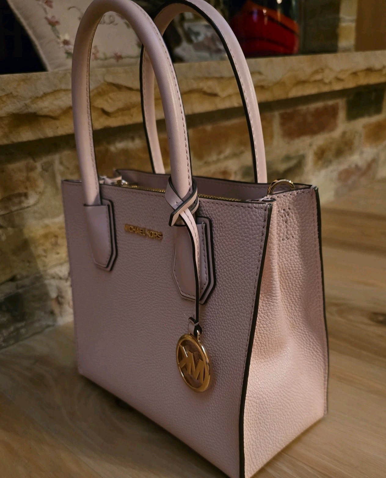 Michael Kors Pink Powder Blush Leather Bag is 10 x 9″ and 6″ deep