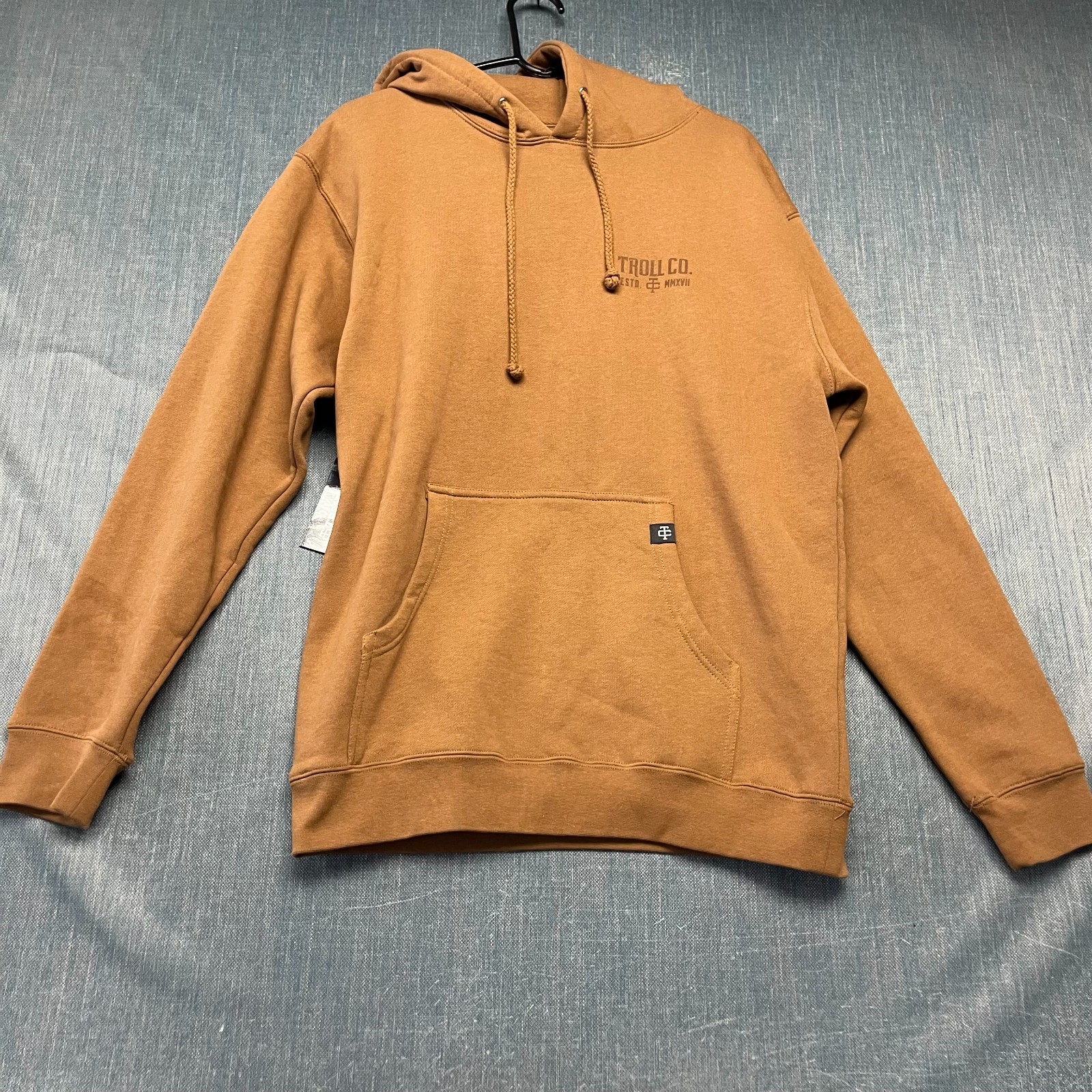 Troll Co Men’s Pay Me Hoodie Size M Saddle Brown Pullover Graphic Sweatshirt