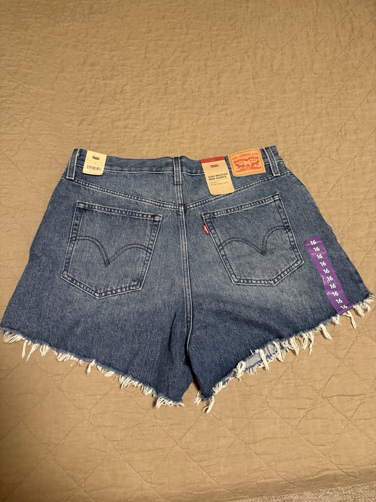 Levi’s Women’s High-Waisted Relaxed Fit Blue Denim Mom Shorts Cut Offs Size 33