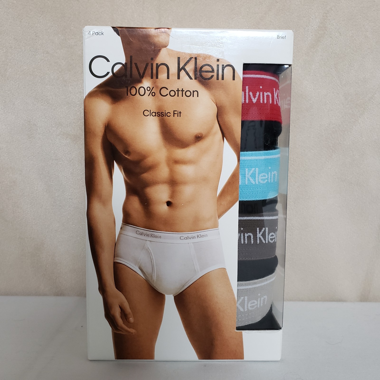 Calvin Klein Men’s Classic Briefs 4 pack Black with Red, Light Blue, Brown, Tan