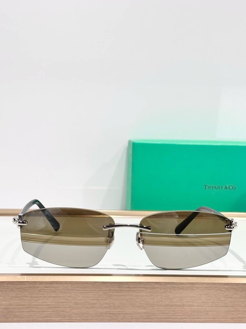 Tiffany & Co. Rimless Rectangle Sunglasses Silver Frame Brown Lenses Unisex Luxu