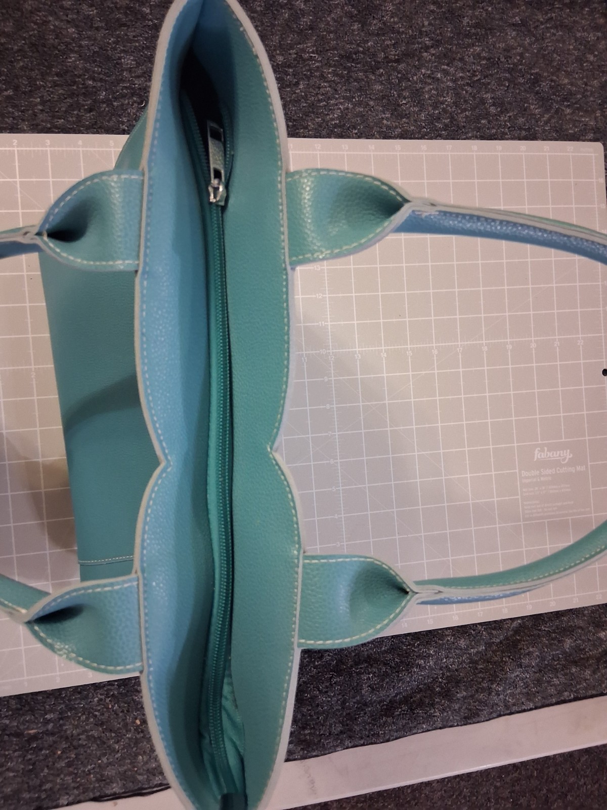 Mellow World tote grained vegan leather tulip curved front panel vibrant teal