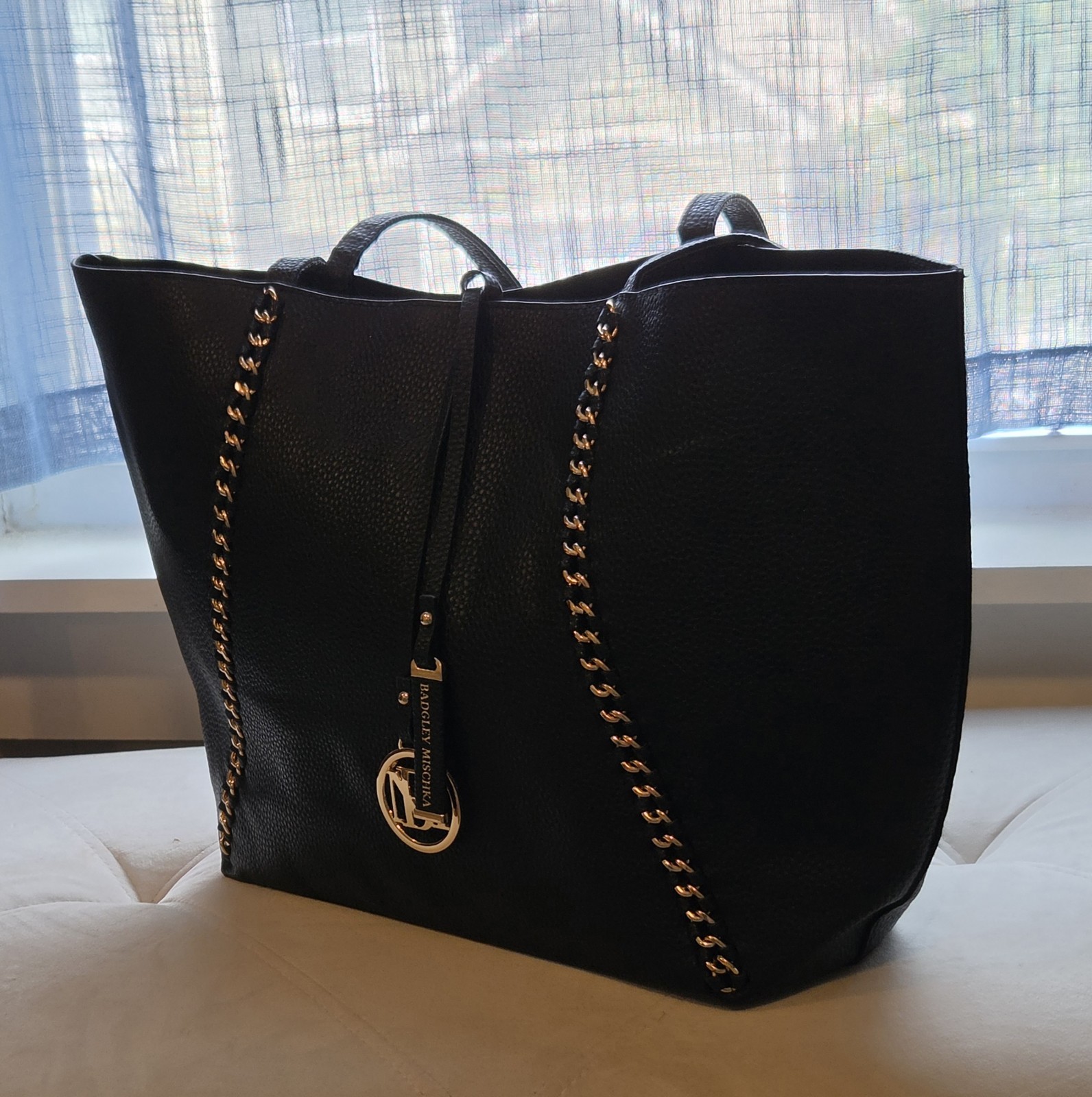 Badgley Mischka Black Vegan Leather Tote With Gold Chain And Logo Charm Details