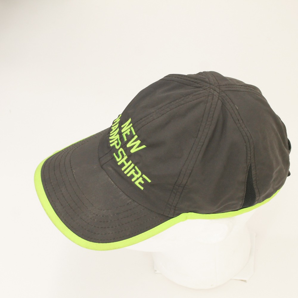 New Hampshire green on lightweight gray running cap