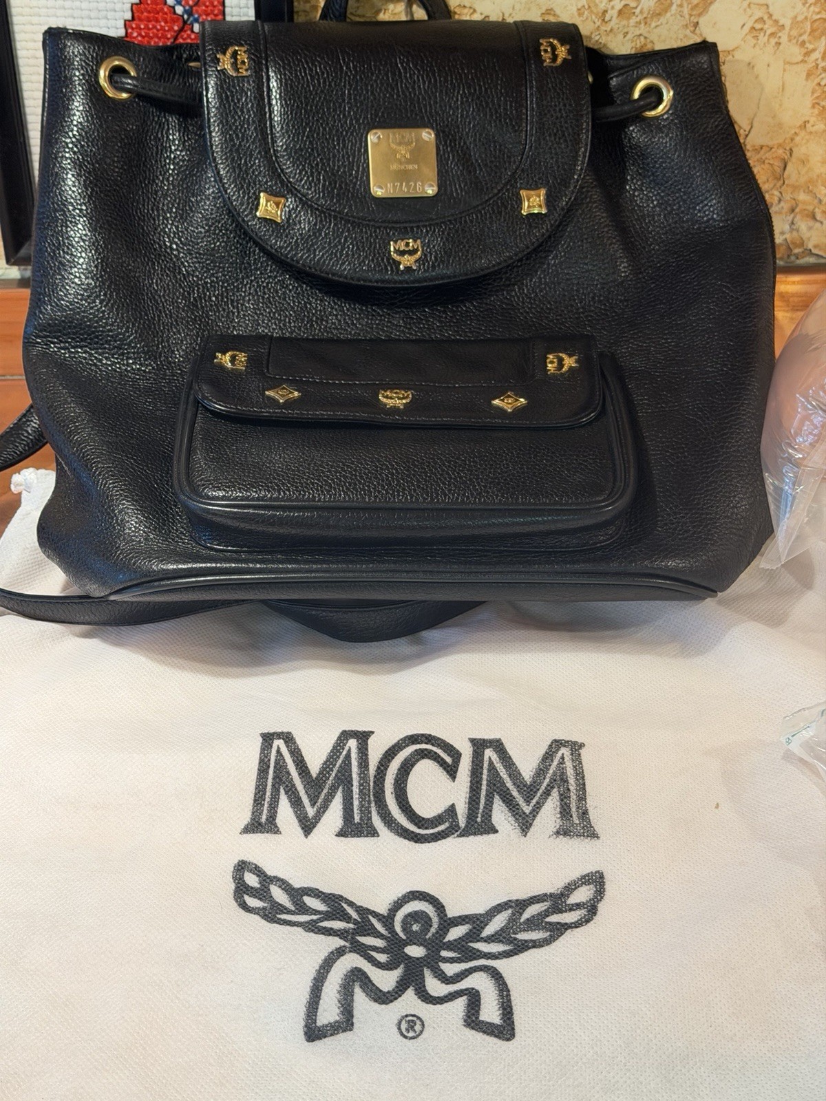 MCM Black Drawstring Backpack, Magnetic Closure, Gold Hardware, Dust Bag