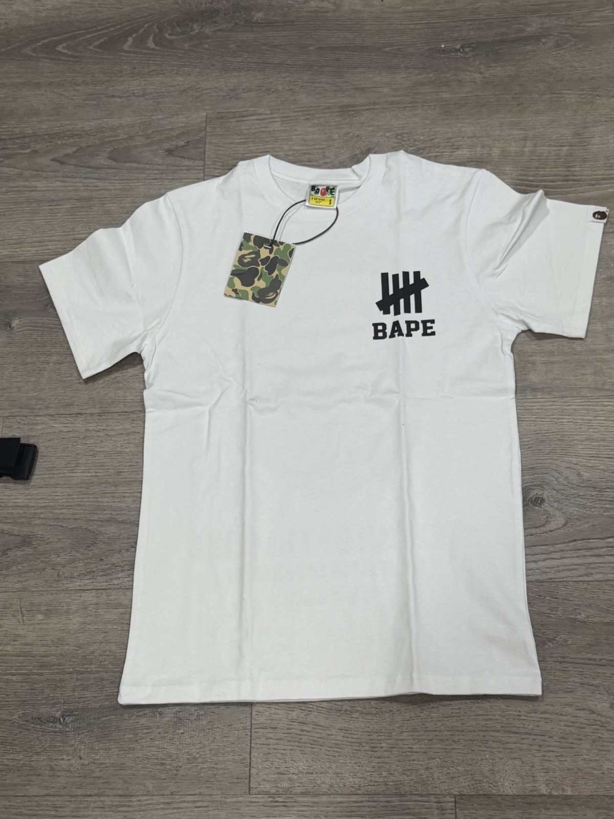 BAPE × undefeated logo T-shirt White A Bathing Ape Size S