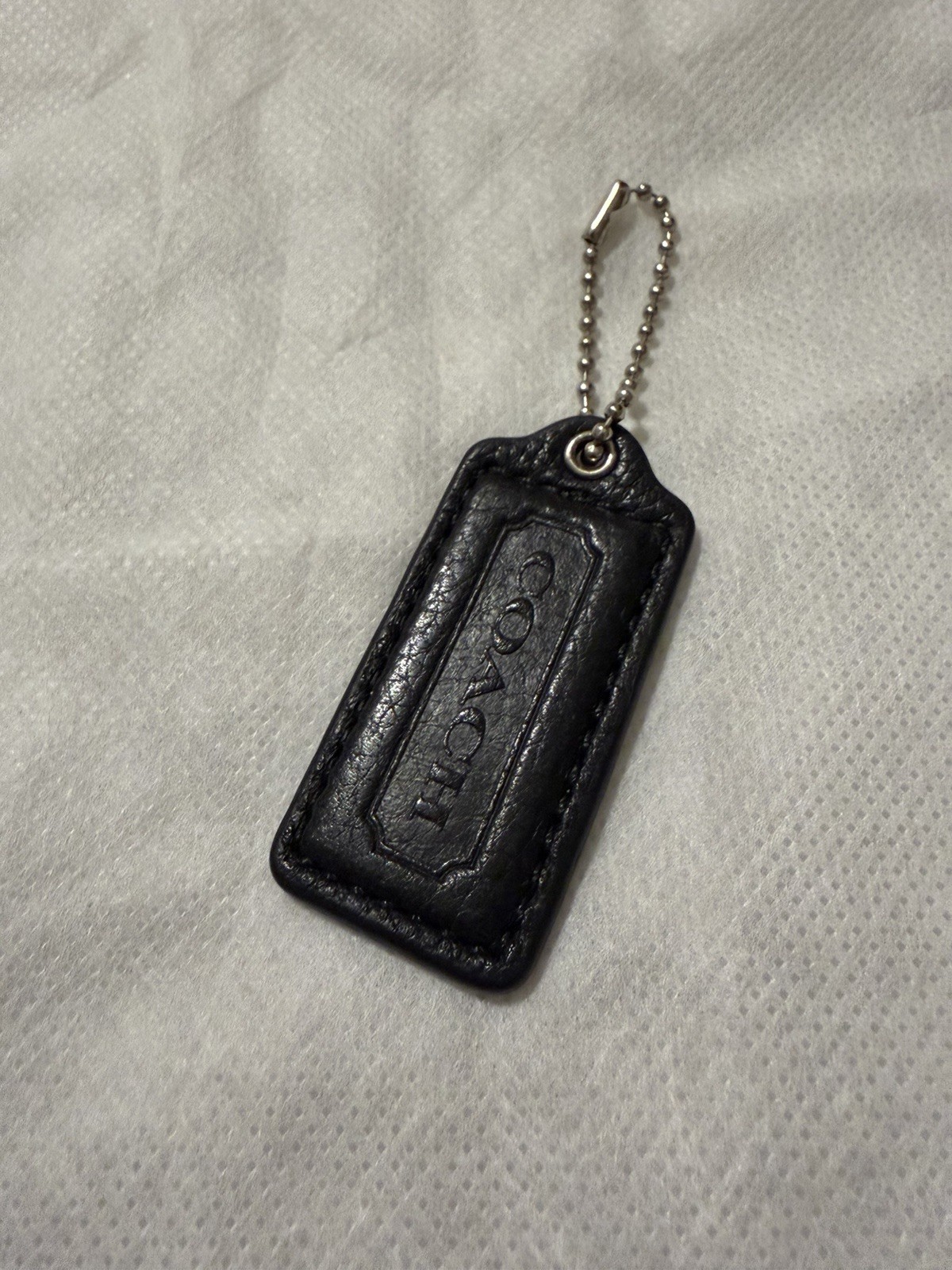 Coach Hang Tag