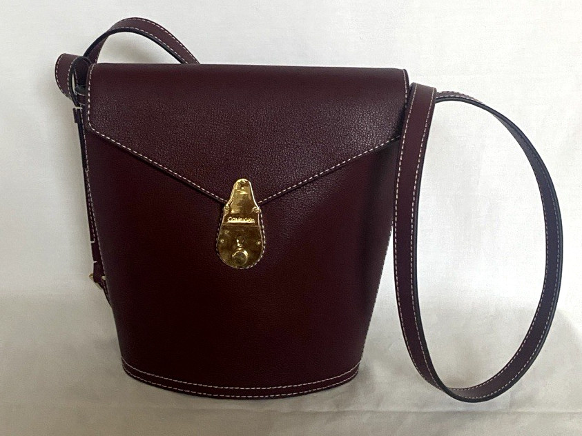 NEW Calvin Klein Crossbody Bucket Bag Statement Series Leather Lock Walnut GOLD