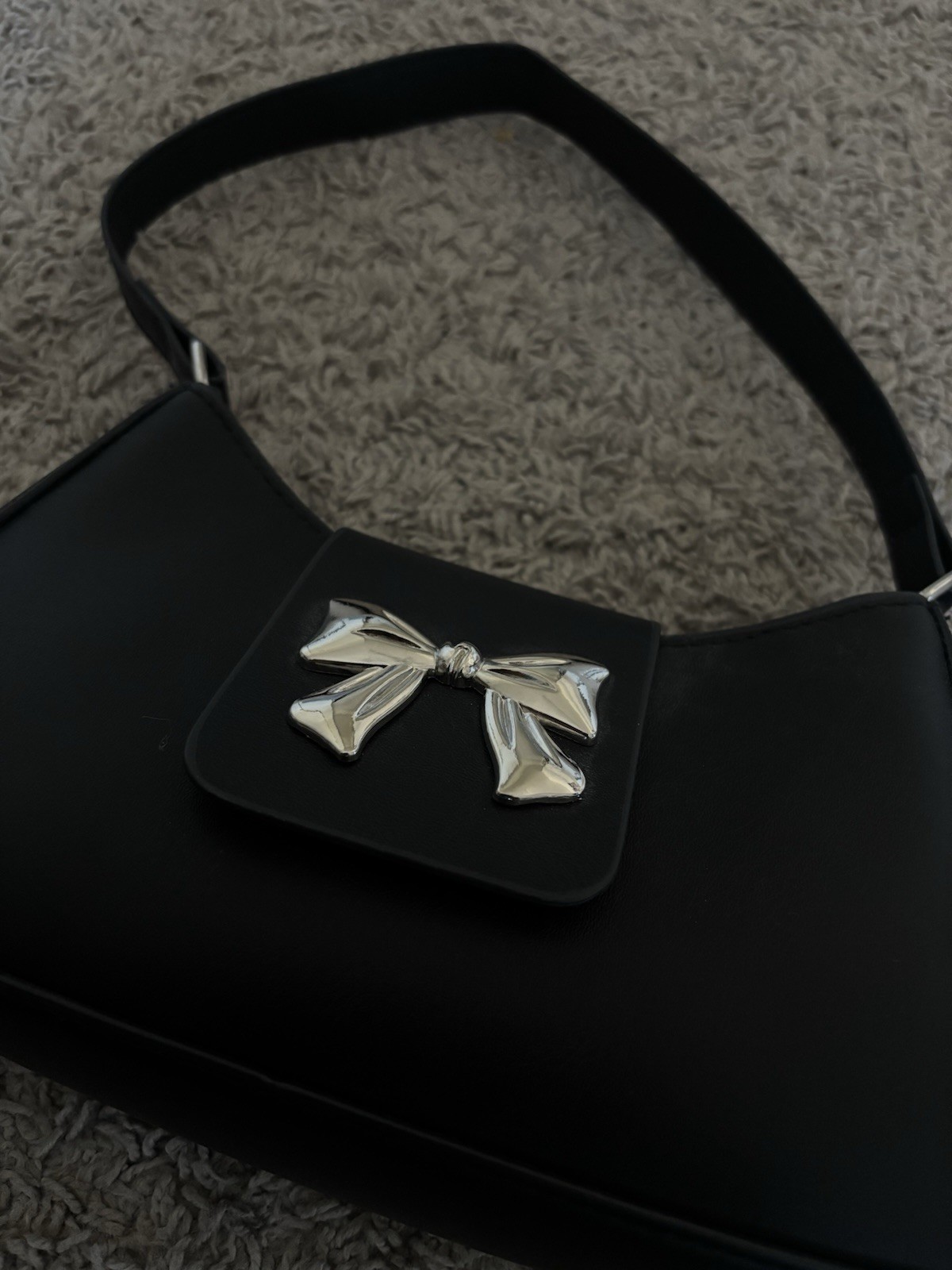 Women’s Black Small Shoulder Bag Silver Bow Accent Zip Closure Trapezoid