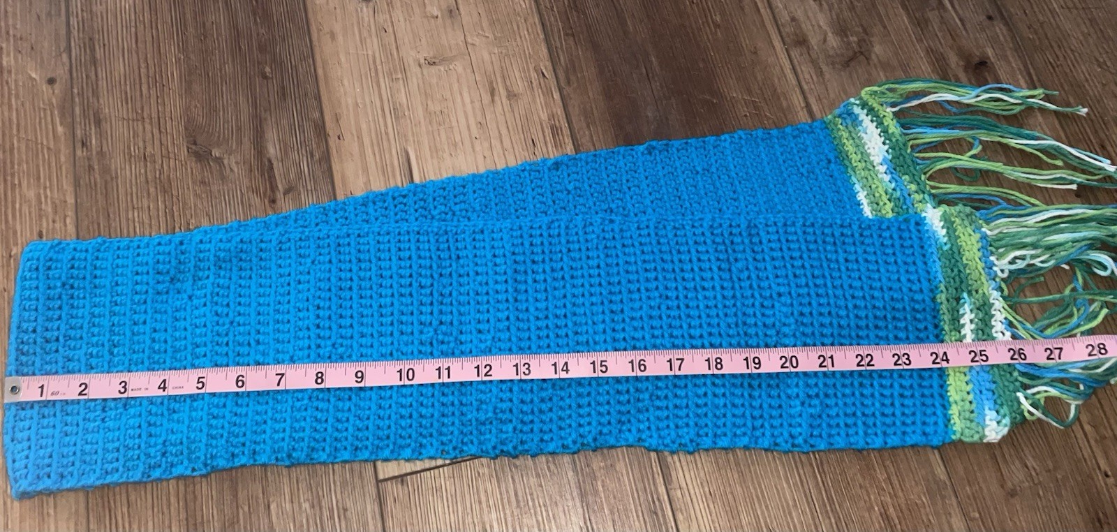 Homemade Crocheted Scarf With Fringes On The End