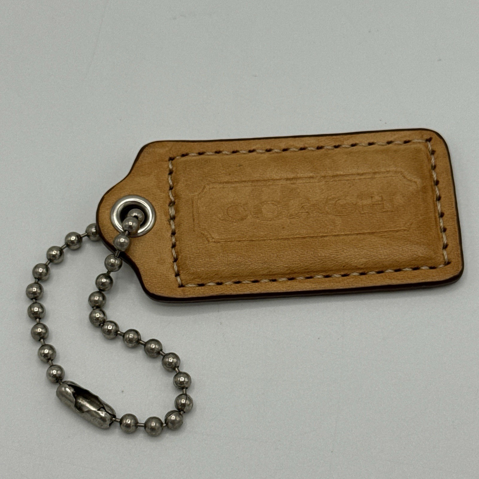 Coach Hang Tag Light Brown Leather Colored 2 & 1/2 Inches Wide / Silver Tone