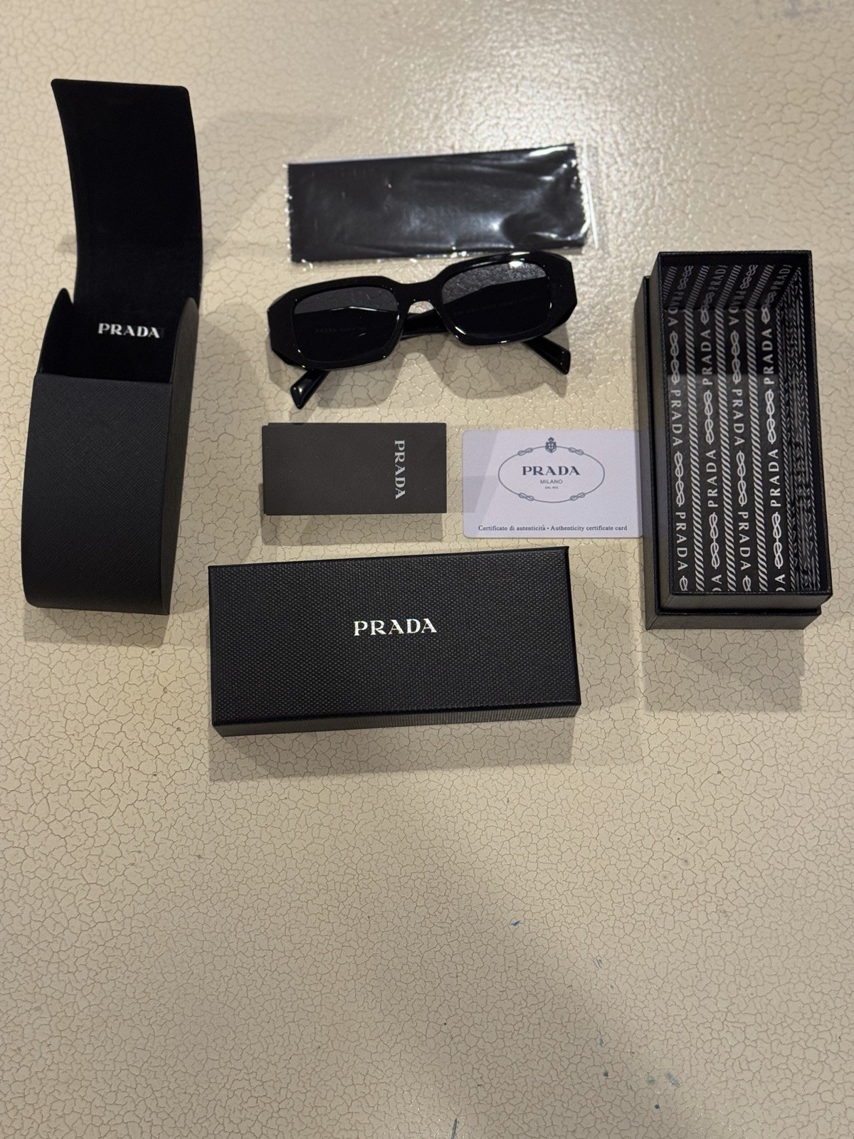Prada PR17WS Black Frame Sunglasses with Dark Lenses – Free Shipping.