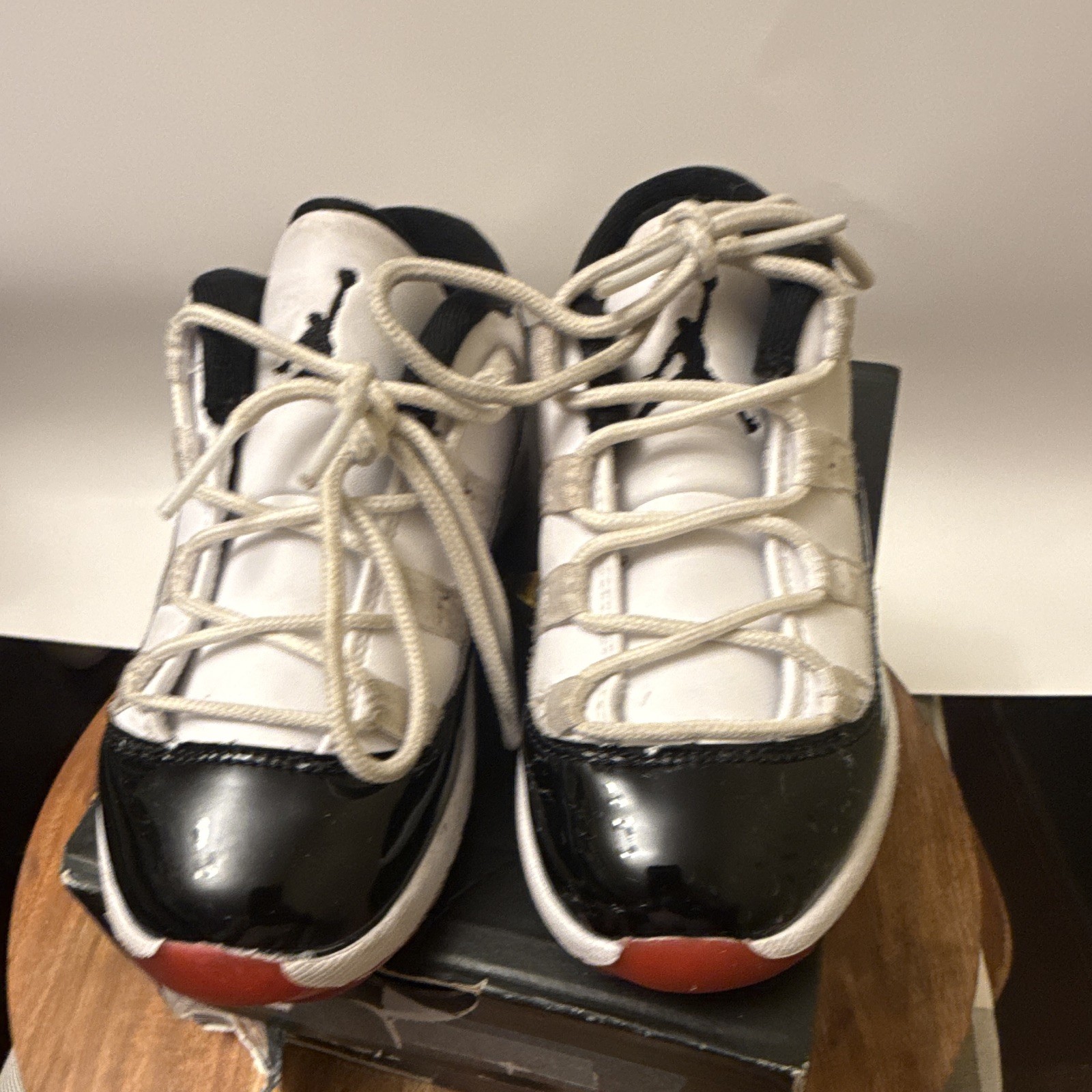 Jordan Jordan 11 Low Unisex Kids Athletic Sneaker White/Black/Red US 10C