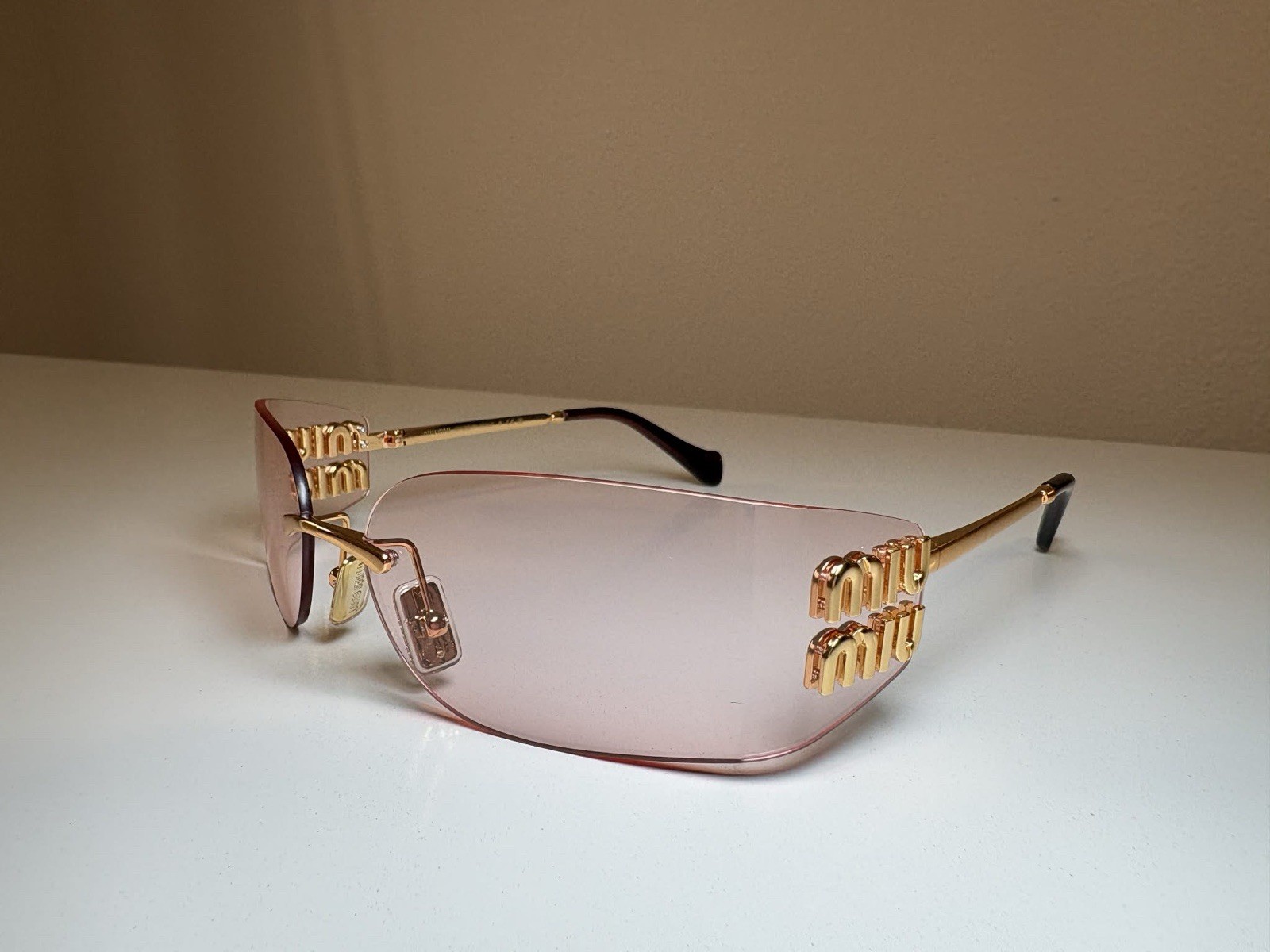Miu Miu MU A51S ZVN90O Light Pink Lens Women’s Sunglasses