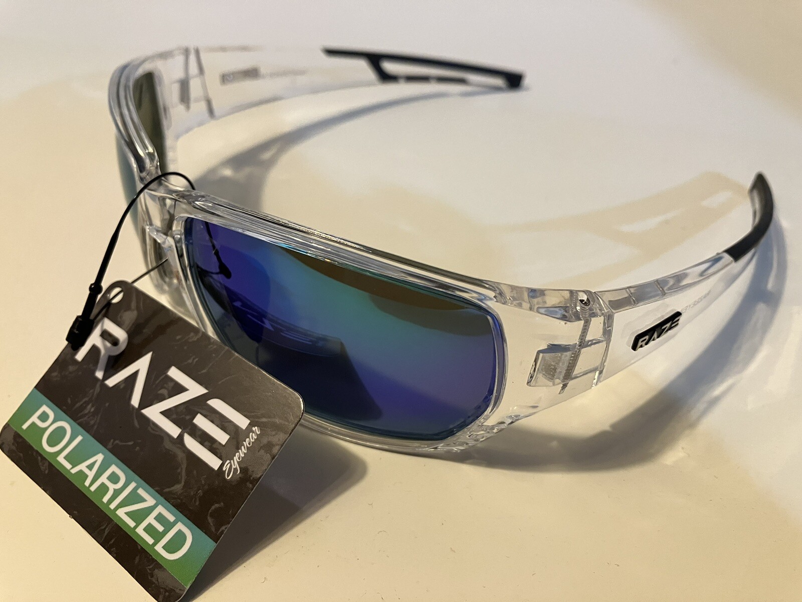 RAZE Eyewear Sunglasses Sonar Polarized Clear Frame Blue Mirror Smoke 28856