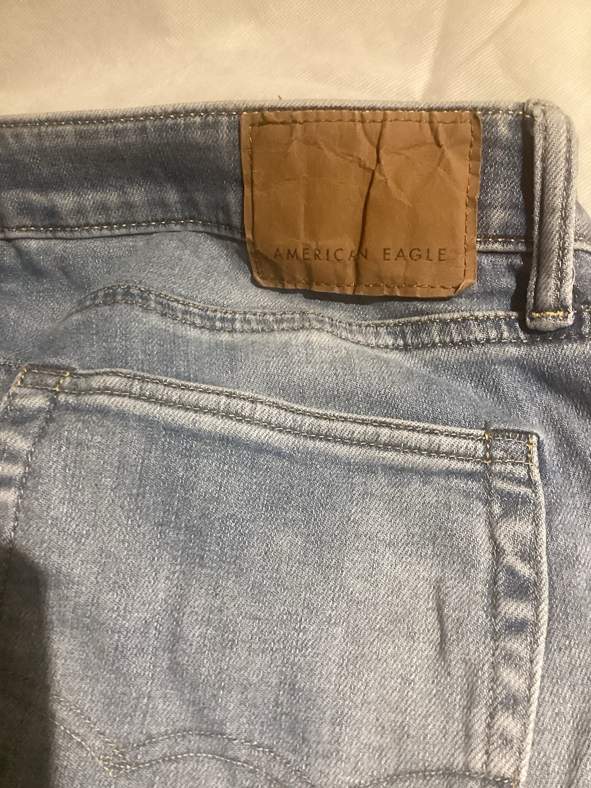 American Eagle Men’s Next Level Air Flex Slim US 33×32–Light Blue -Distressed