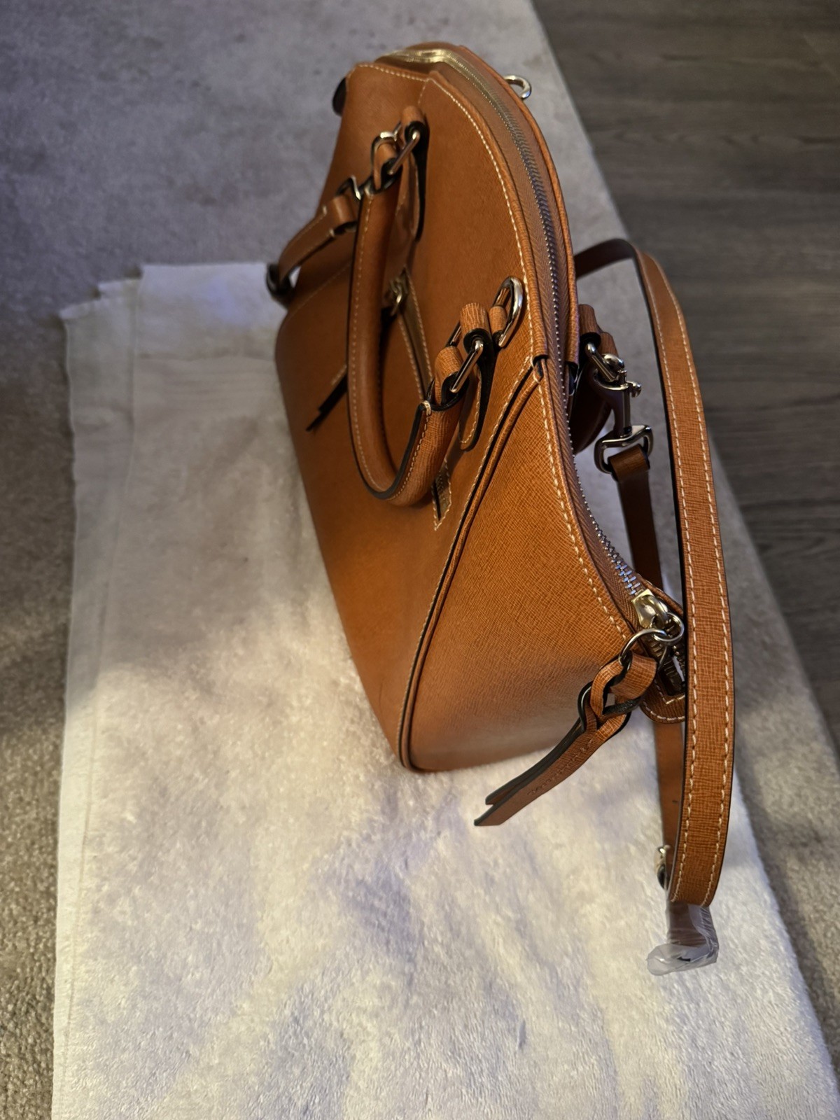Dooney and Bourke 1975 Saffiano Leather Sydney Satchel Domed cross body.