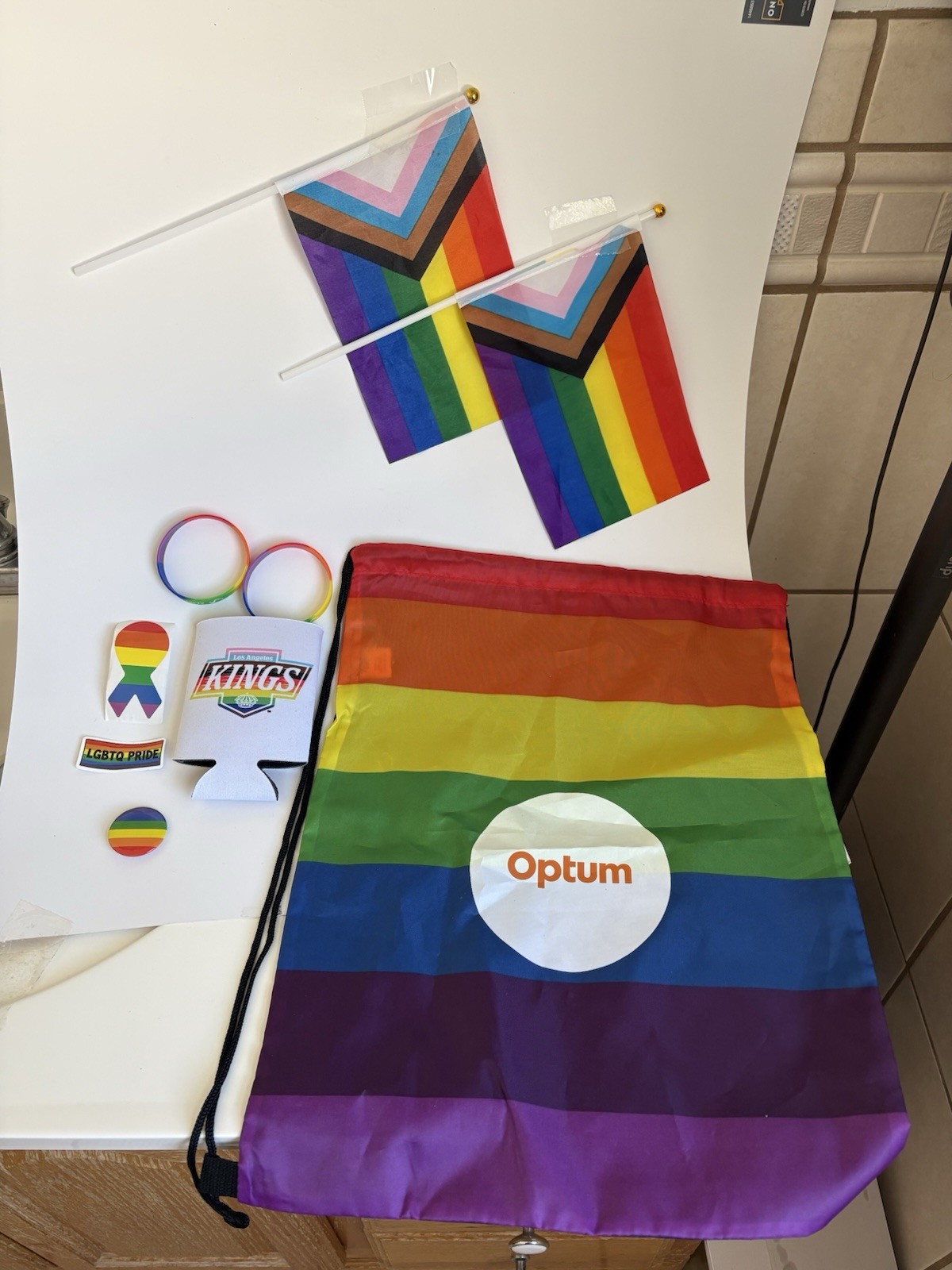 Optum Rainbow Pride Drawstring Backpack, Logo Accent, Adjustable Black Strap