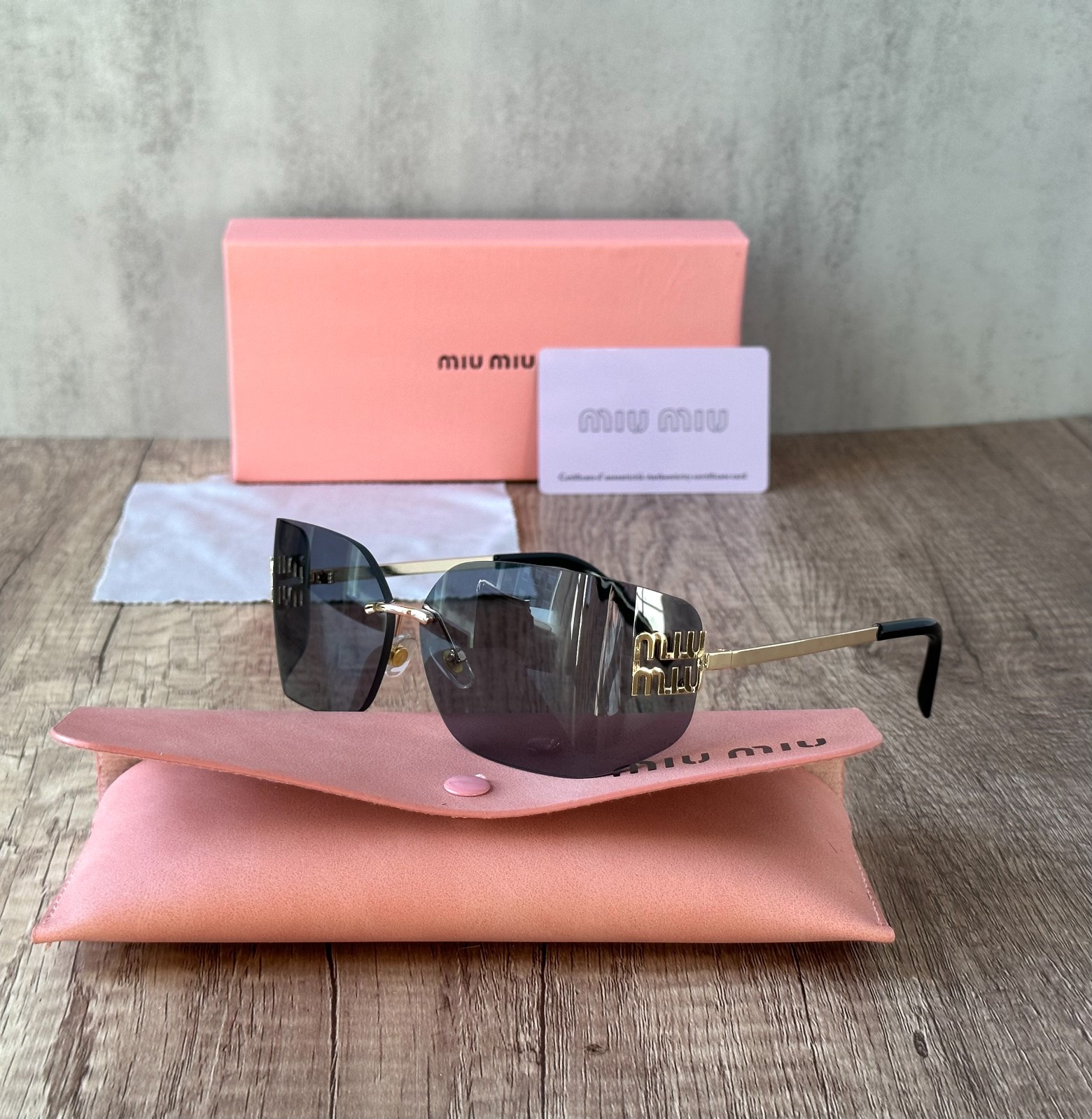 MIU MIU SUNGLASSES BLACK GRAY 100% AUTHENTIC WITH ORIGINAL PACKAGE SHIELD