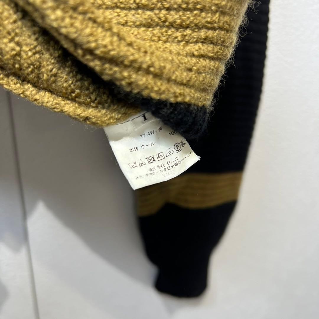 CULLNI Wool striped knit sweater with side zip design
